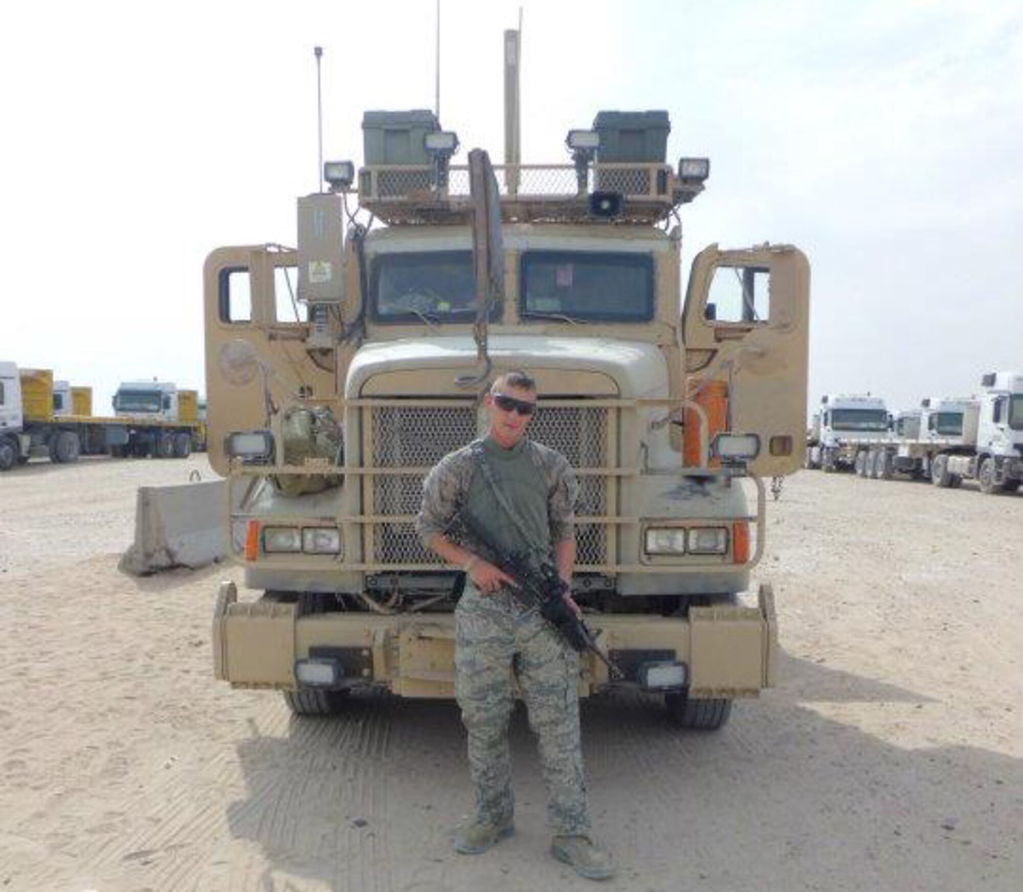 Senior Airman William Peters prepares for a convoy during his deployment to Camp Arifjan, Kuwait. Peters was deployed July 2011 through February 2012, during which he was a part of convoys that went into Iraq to bring equipment in and out of the country. Peters is with the 509th Logistics Readiness Squadron vehicle operations at Whiteman Air Force Base, Mo. (Courtesy Photo)