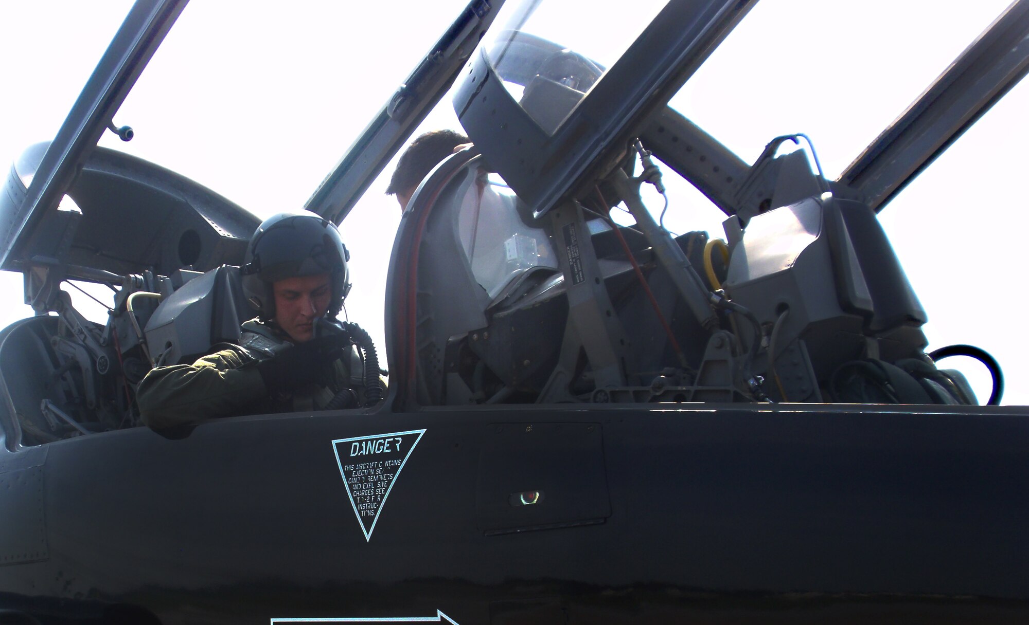 U.S. Air Force Staff Sgt. Cameron Schott, 1st Maintenance Squadron low-observable, aircraft structural maintainer, is strapped into the seat of a T-38 Talon prior to his flight over Langley Air Force Base, Va., June 29, 2012. Schott said the flight served as a reminder that hard work and perseverance will eventually pay off. (U.S. Air Force courtesy photo/Released)