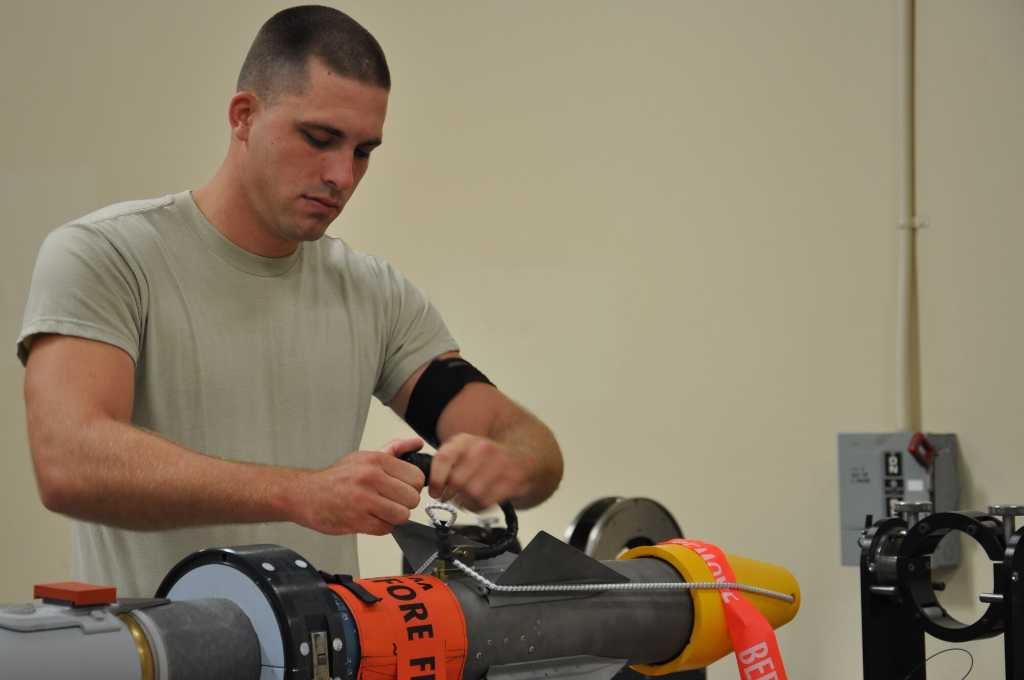 Senior Airman Kyle Larson, 325th Maintenance Squadron munitions systems journeyman, recently earned the 2011 AIM-9X "Cutting Edge" Air Force award. (U.S. Air Force photo by Senior Airman Rachelle Elsea)