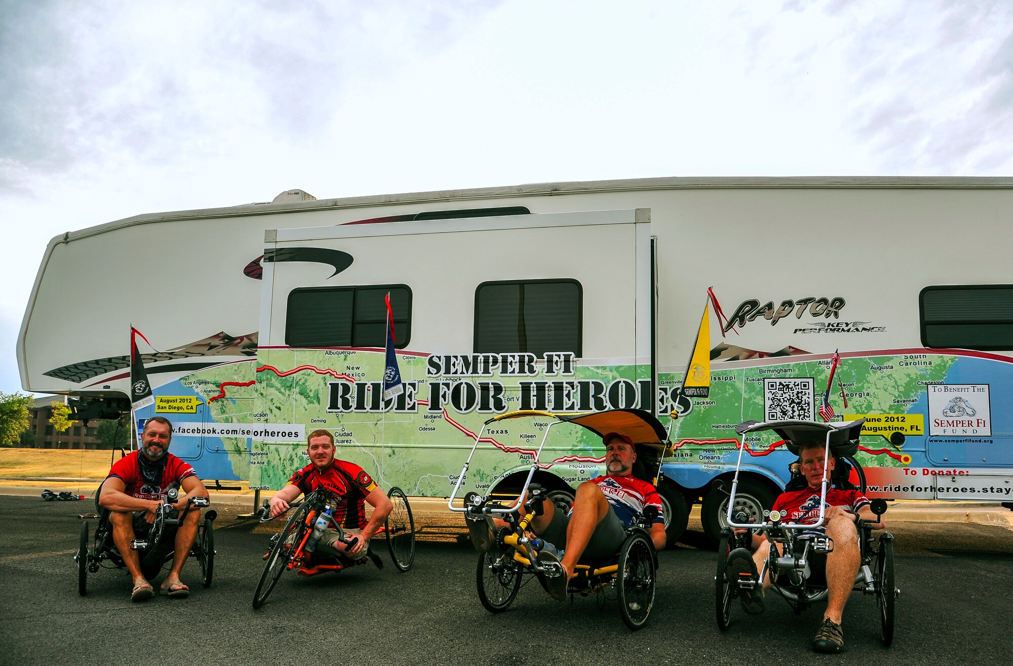 GOODFELLOW AIR FORCE BASE, Texas-- Members of the Ride for Heroes team pose for a picture July 9. Ride for Heroes raises funds for the Injured Marine Semper Fi Fund by biking across the U.S. in two months. (U.S. Air Force photo/Airman 1st Class Michael Smith)