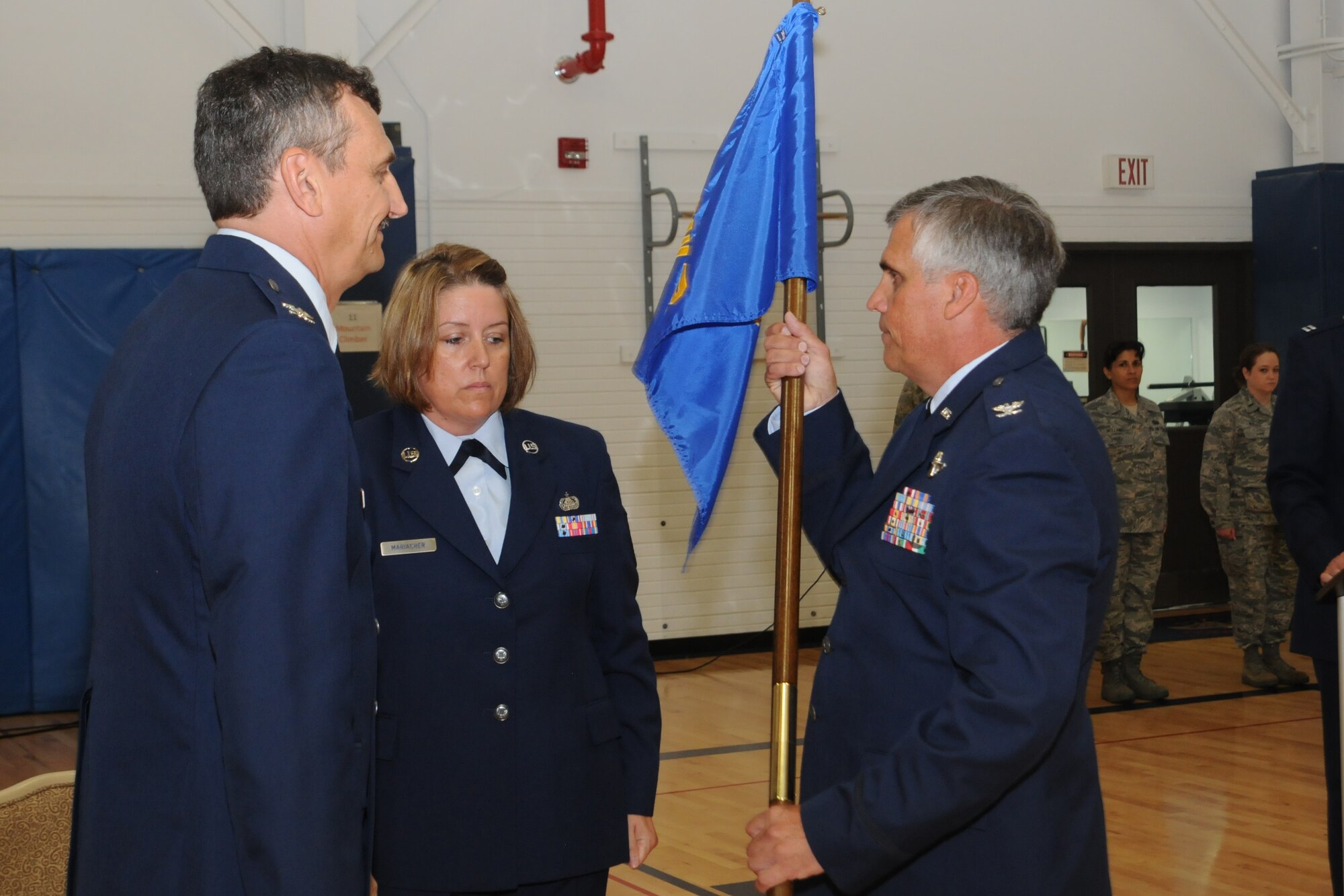 YOUNGSTOWN AIR RESERVE STATION, Ohio – Col. William Phillips, new 910th Operations Group commander, receives the guideon from Col. Reinhard Schmidt, 910th Airlift Wing commander, at an assumption of command ceremony July 7, 2012, here. Phillips comes to YARS from Air Force Reserve Command Current Operations. (U.S. Air Force photo/Tech. Sgt. Matt Matulka)