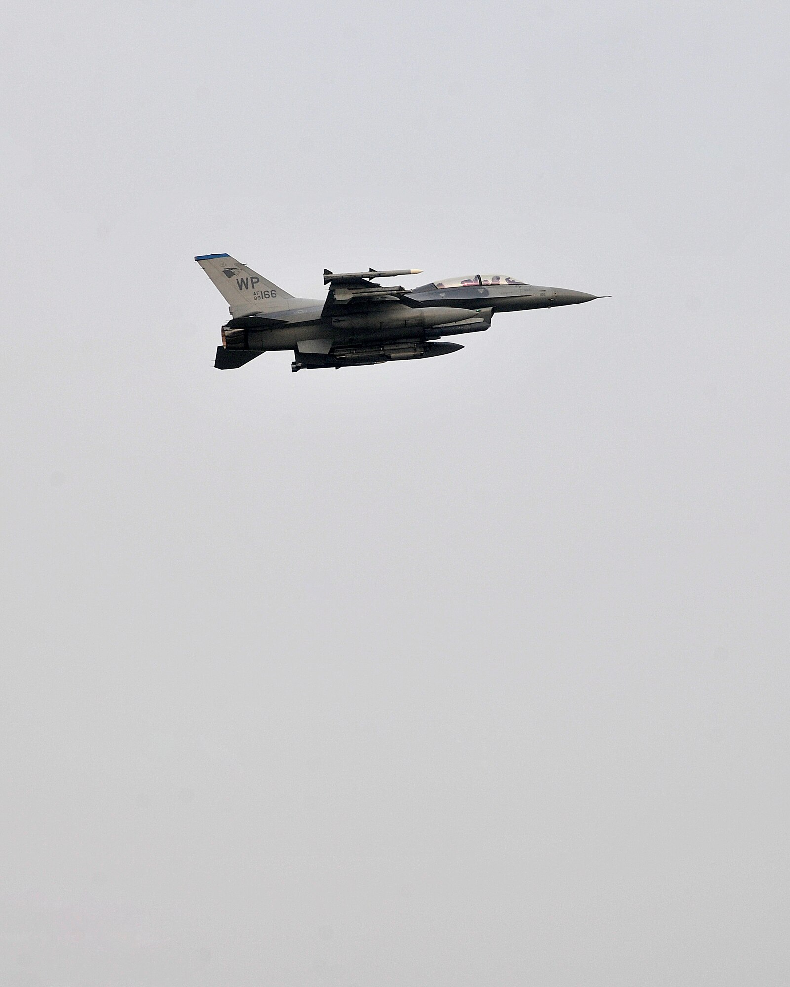 An F-16 flies above Kunsan Air Base, Republic of Korea during exercise Beverly Midnight 12-03, July 9, 2012. The exercise tests the base’s deployment and operational readiness and is the first since the base unit compliance inspection in April. (U.S. Air Force photo/Staff Sgt. Jonathan Fowler)
