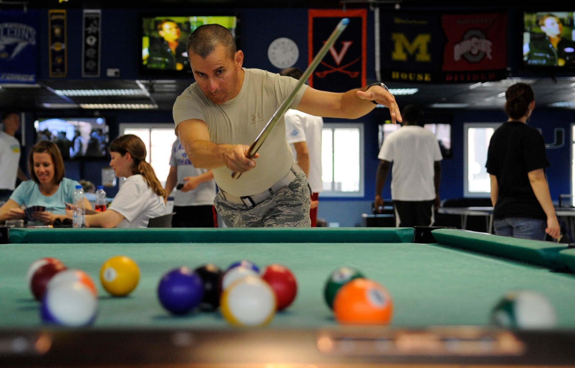 SOUTHWEST ASIA – Master Sgt. Diego Velasquez, 386th Force Support Squadron, plays pool during the first round of the billiards tournament at the Freedom Fest 2012 here July 4. He placed third overall. (U.S. Air Force photo/Staff Sgt. Alexandra M. Boutte)