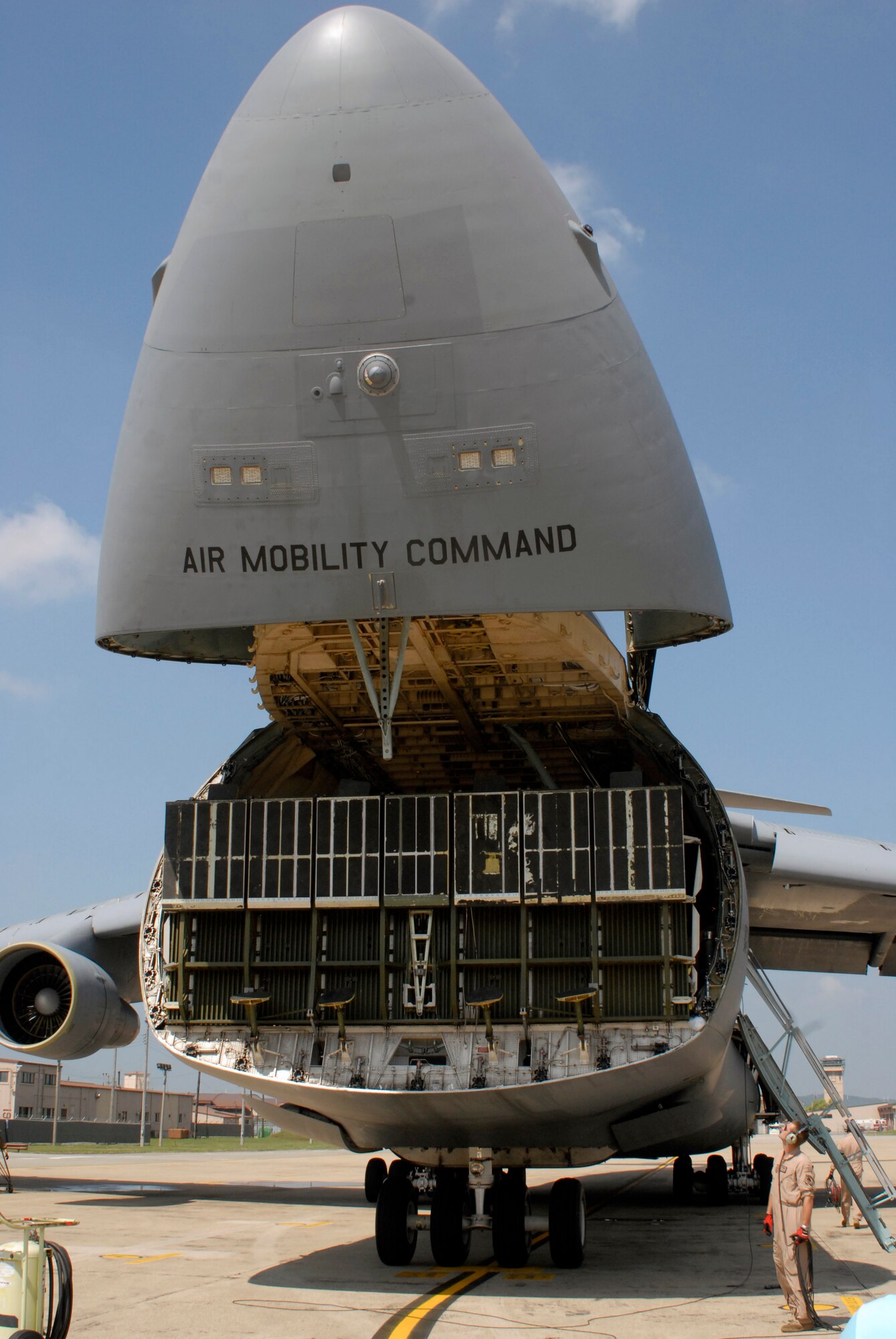 A C-5 Galaxy of the 22nd Airlift Squadron arrives at Osan Air Base, Republic of Korea, from Travis Air Force Base, Calif., July 7, 2012. The C-5 delivered two Mine Resistant Ambush Protected vehicles to the penninsula. This is the second shipment of MRAP vehicles, and they augment the U.S. Army capability in Korea. (U.S. Air Force photo/Tech. Sgt. Eric Petosky)