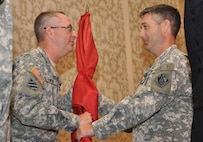 Lt. Col. Andrew D. Kelly assumes command of the U.S. Army Corps of Engineers, Walla Walla District, from Northwestern Division Commander Col. Robert A. Tipton during a change-of-command ceremony held in Walla Walla, Wash., on July 10.