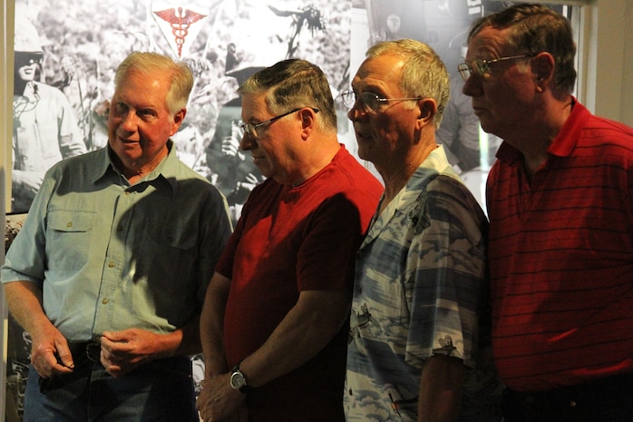 From left to right, Richard D. Wright, James "Jim" Wright, Jerry Wright and William "Bill" Wright view various exhibits during their tour of the Command Museum aboard Marine Corps Recruit Depot San Diego. Brothers Jim, Bill and Jerry are all former Marines who attended recruit training aboard the depot and were honorably discharged more than fifty years ago.