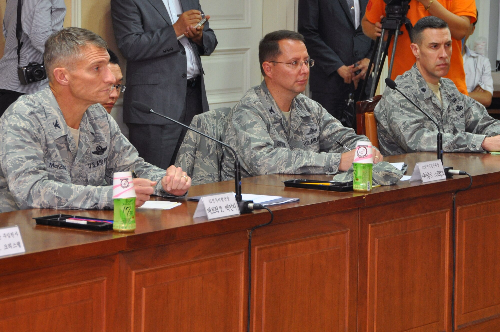 (From left to right) Col. Patrick McKenzie, 51st Fighter Wing commander, Col. Michael Strunk, 51st Mission Support Group commander, and Lt. Col. Jason Beck, 51st Security Forces commander, attend a meeting with city officials in Pyeongtaek, Republic of Korea, July 10, 2012. The commanders and city officials discussed joint town patrols, Korean Nation Police assistance with parking restrictions, the off-limits establishments to U.S. Forces Korea personnel and expanding the Osan and Songtan Community Advisory Council. (U.S. Air Force photo/Capt. Cody Chiles)