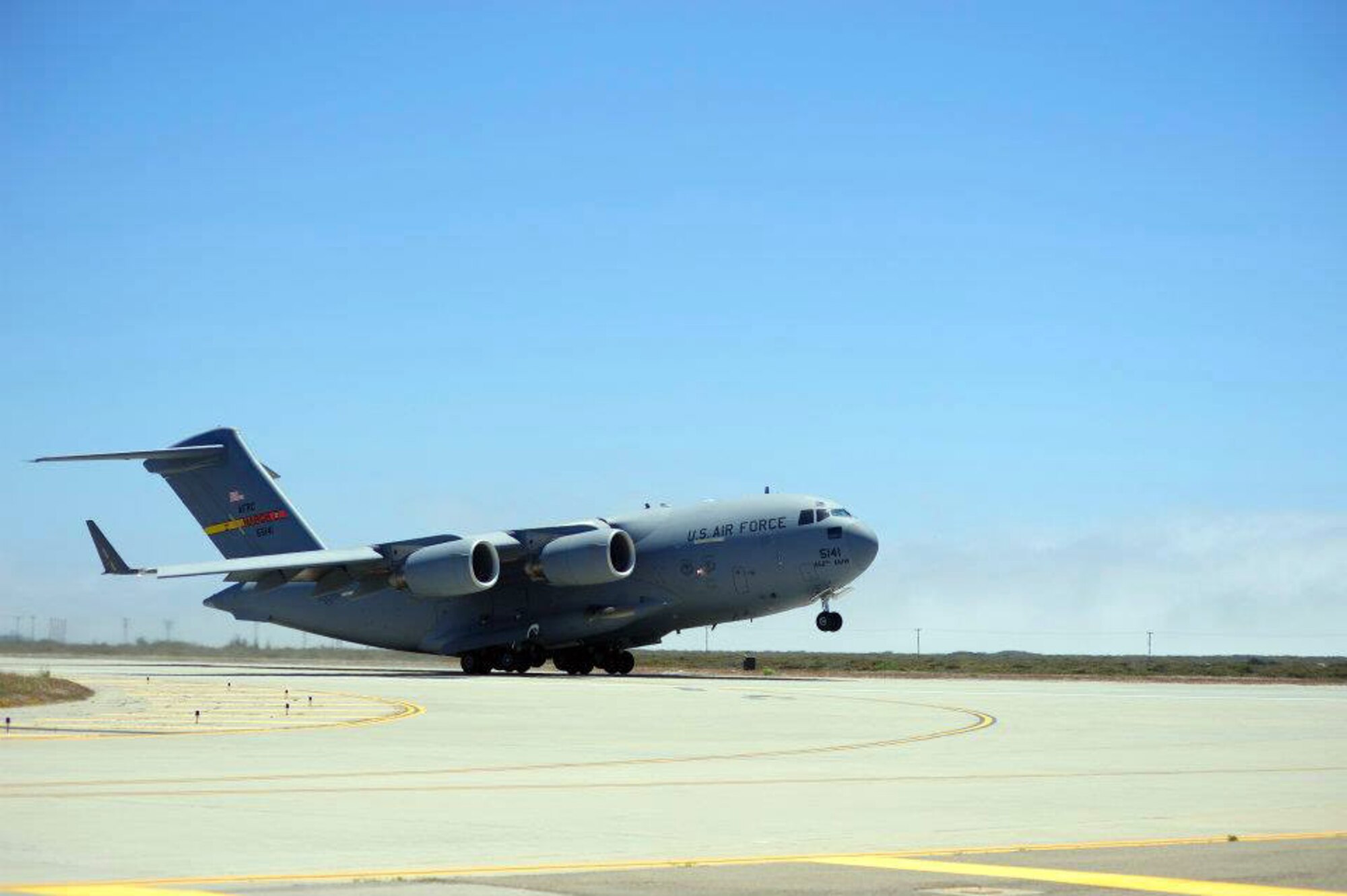 A Vandenberg Air Force Base Hot Shots vehicle backs into the belly of a March Air  Reserve Base, Calif., C-17 Globemaster III at Vandenberg AFB, Calif., on June 27, 2012. Eighteen members of the Vandenberg Hot Shots crew, along with two crew carrier vehicles, one superintendent support vehicle and one all terrain vehicle, deployed to Colorado to support the wild land fire-fighting efforts. (U.S. Air Force photo by Staff Sgt. Andrew Satran)