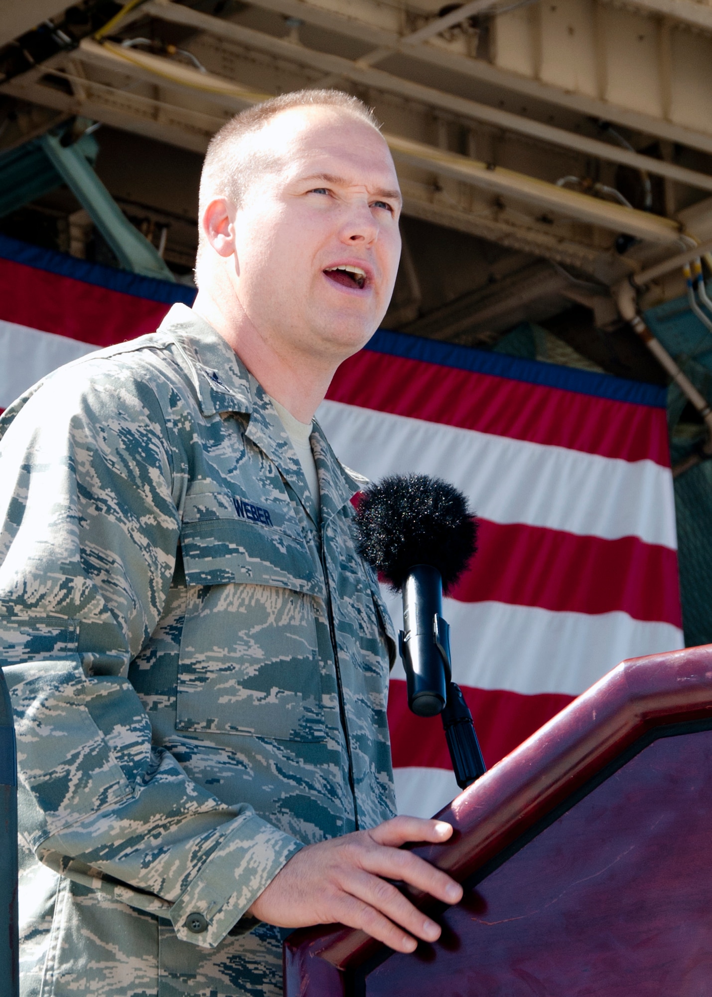 Col. Mark Weber, 60th Maitenance Group commander, speaks to the audience Tuesday after assuming command of the group. (U.S. Air Force photo/T.C. Perkins)
