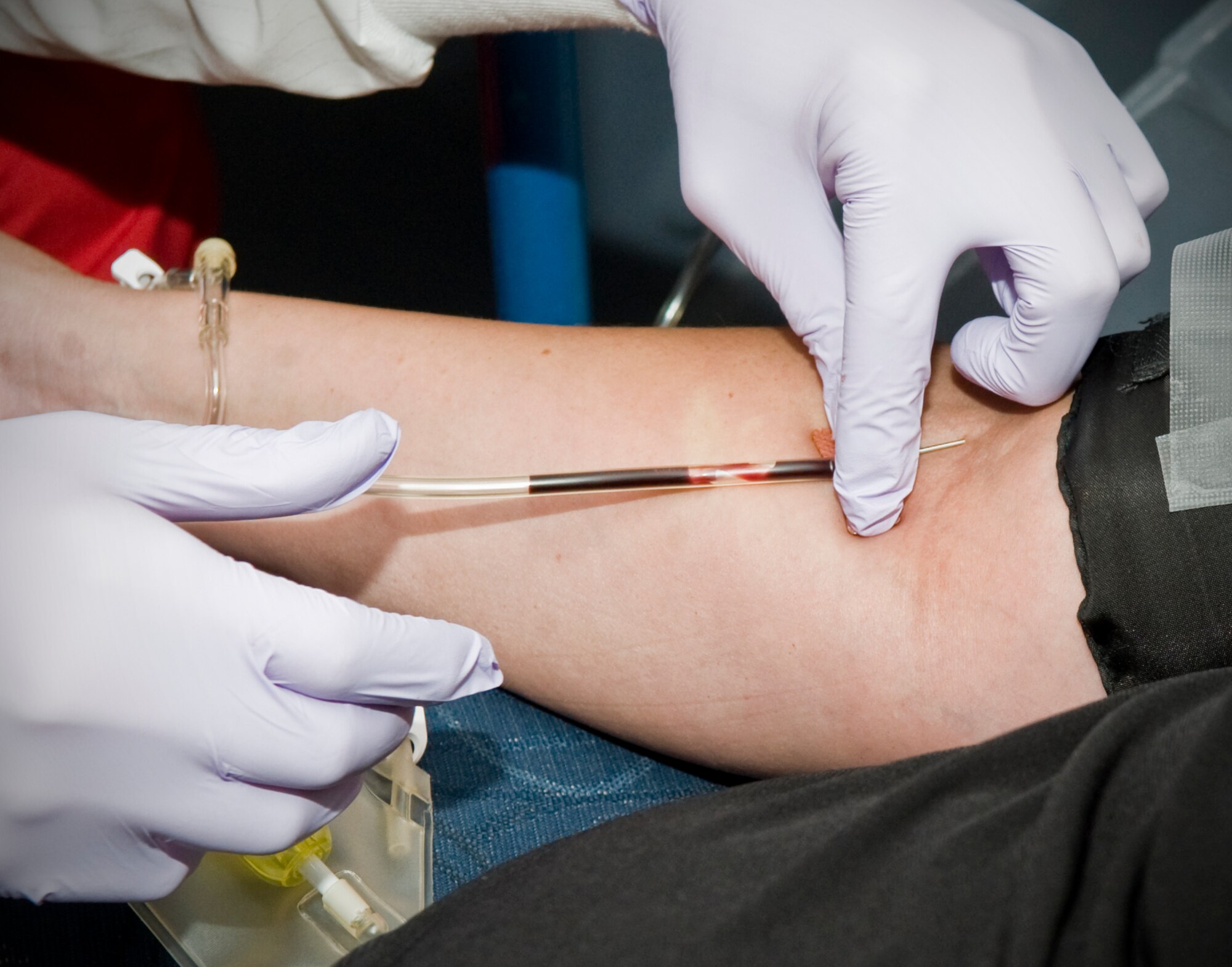 Emily Swanger, 7th Medical Operations Squadron, has her blood drawn during an on-base blood drive July 11, 2012, at Dyess Air Force Base, Texas. Meek Blood Center supplies blood to 15 hospitals and medical facilities throughout 12 Texas counties. For more information on donating blood, call (325) 670-2798 or logon to their Web site at www.meekbloodcenter.org. (U.S. Air Force photo by Airman 1st Class Jonathan Stefanko/ Released)