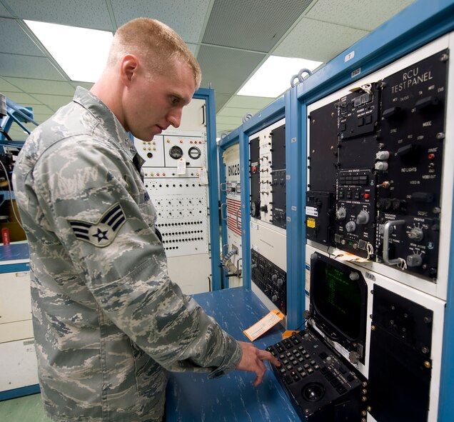 Senior Airman David Hammett, 2nd Maintenance Squadron Avionics Flight, calibrates equipment used to test an antenna from a B-52H Stratofortress on Barksdale Air Force Base, La., July 10. Airmen from the avionics flight maintain the equipment that gives the aircraft weather mapping, ground mapping, aircraft detection, defense and communications capabilities. (U.S. Air Force photo/Staff Sgt. Chad Warren)(RELEASED)