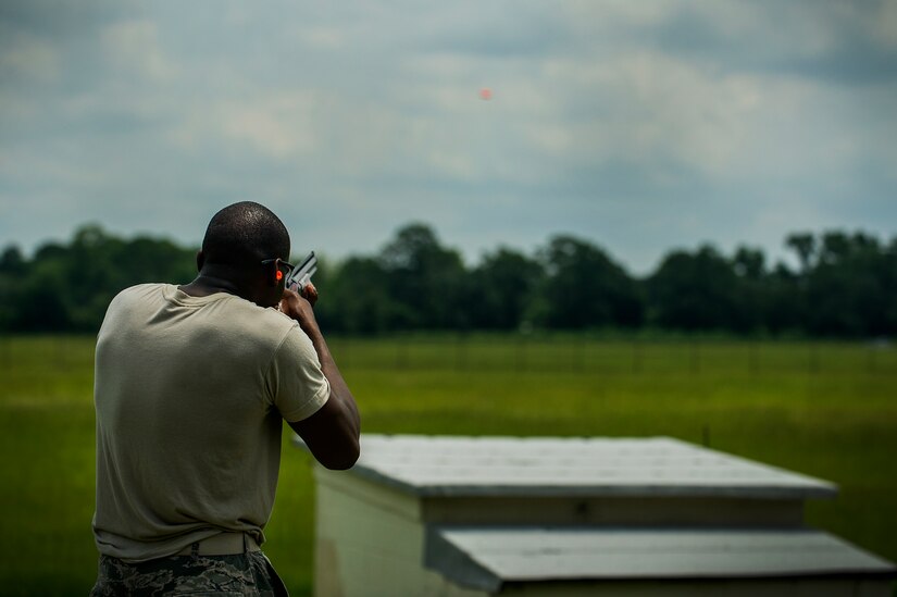 Senior Airman William George, 628th Communications Squadron knowledge operations management journeyman, fires at a clay target during a skeet and trap shoot at Joint Base Charleston - Air Base, S.C., July 11, 2012. The Airmen participated in a skeet and trap shoot sponsored by the Single Airman Initiative Program, which aims to build camaraderie among Airmen and leadership while increasing communication and understanding. (U.S. Air Force photo by Airman 1st Class George Goslin/Released)