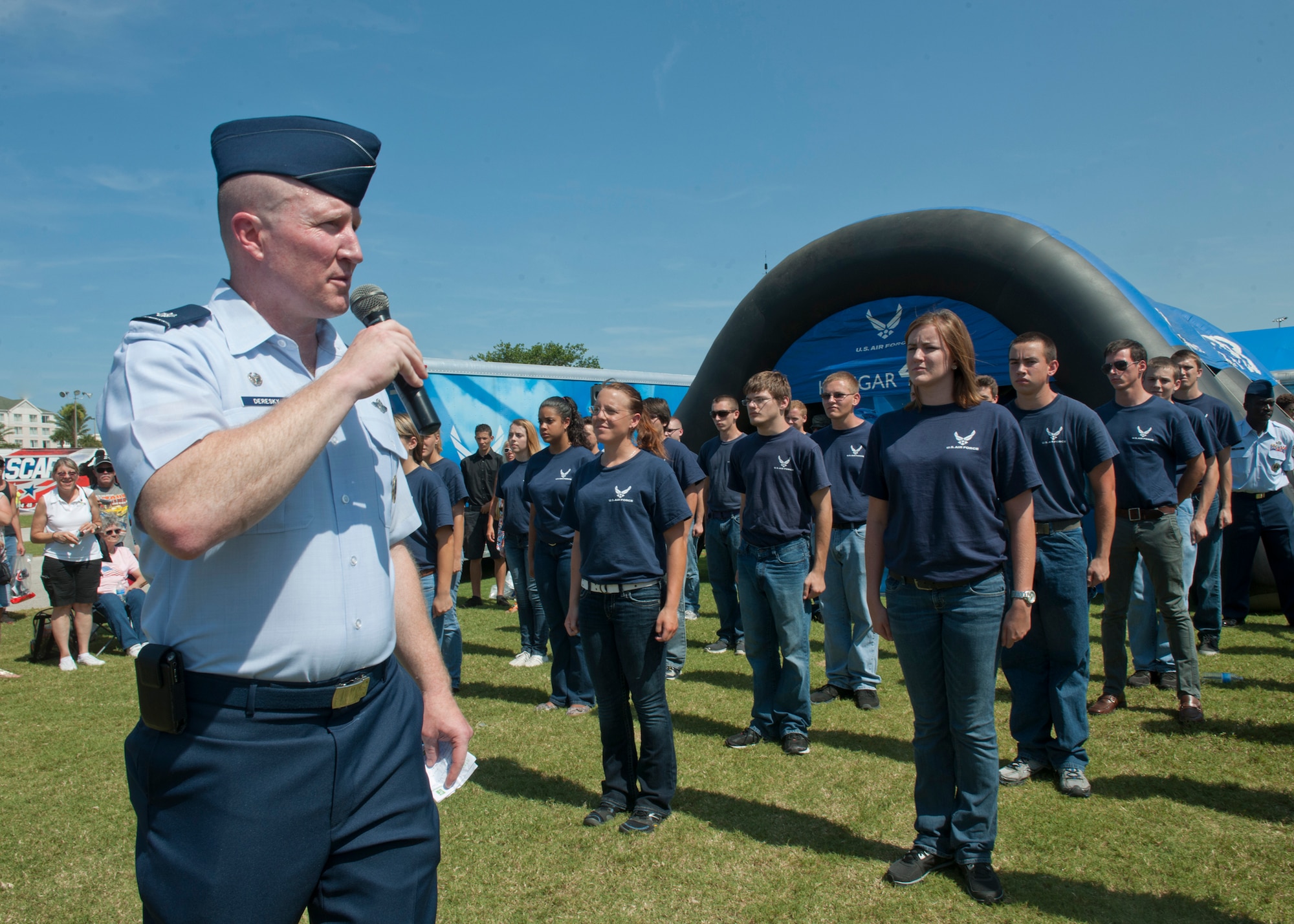 U.S. Air Force Lt. Col. John Deresky, 336th Recruiting Squadron commander, introduces future Airmen in the delayed entry program who will be administered the Oath of Enlistment by Lt. Gen. Stanley Clarke, Continental U.S. North American Aerospace Defense Command Region – 1st Air Force (Air Forces Northern) commander, at the Daytona International Speedway July 7, 2012, at Daytona Beach, Fla. Last year, several DEP members were sworn into the military by Air Force Chief of Staff Gen. Norton Schwartz, and the 336th RCS hopes to have another successful swear-in ceremony by a distinguished visitor next year. (U.S. Air Force photo by Senior Airman Eileen Meier/Released)