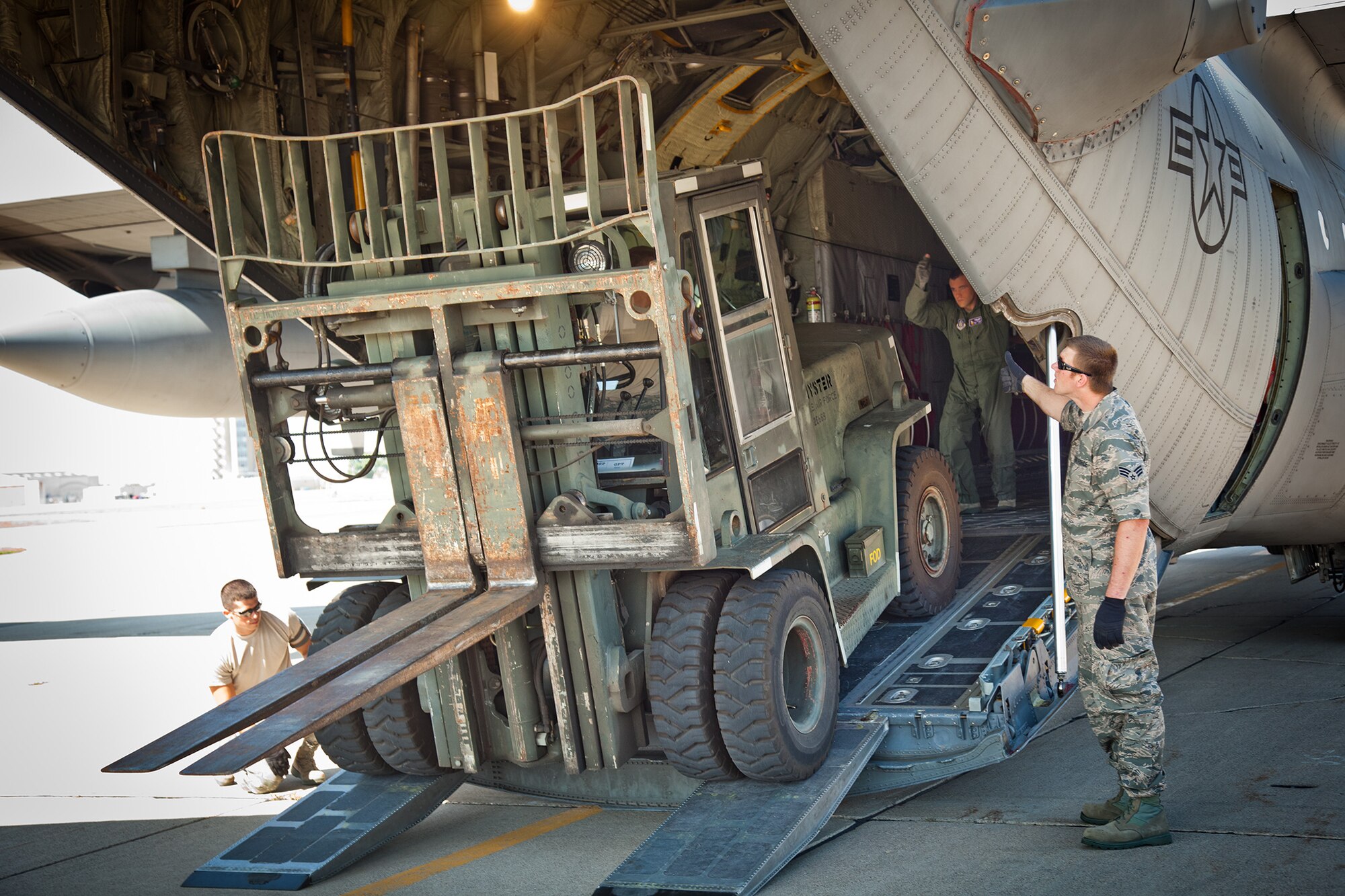 The 27th Aerial Port Squadron conducts a cargo deployment exercise on July 7.  The exercise maintains unit readiness and allows Airmen practice loading and securing many types of equipment.  (U.S. Air Force Photo/Shannon McKay)