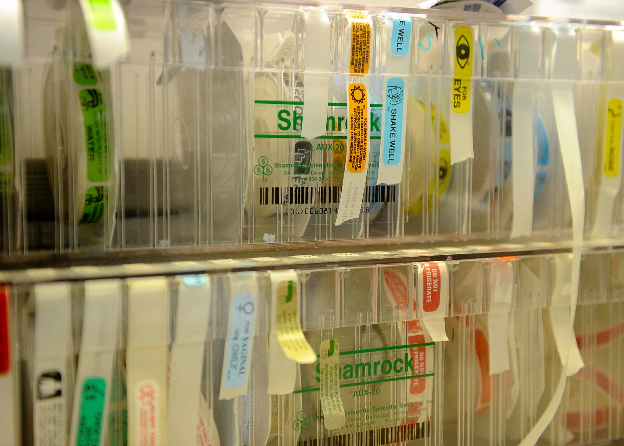 Auxiliary labels are pictured at the pharmacy at Moody Air Force Base, Ga., July 11, 2012. Auxiliary labels are used to provide any extra information relevant to a patient’s prescription medication itincluding directions of use, storage directions and lists of possible side effects. (U.S. Air Force photo by Staff Sgt. Ciara Wymbs/Released) 