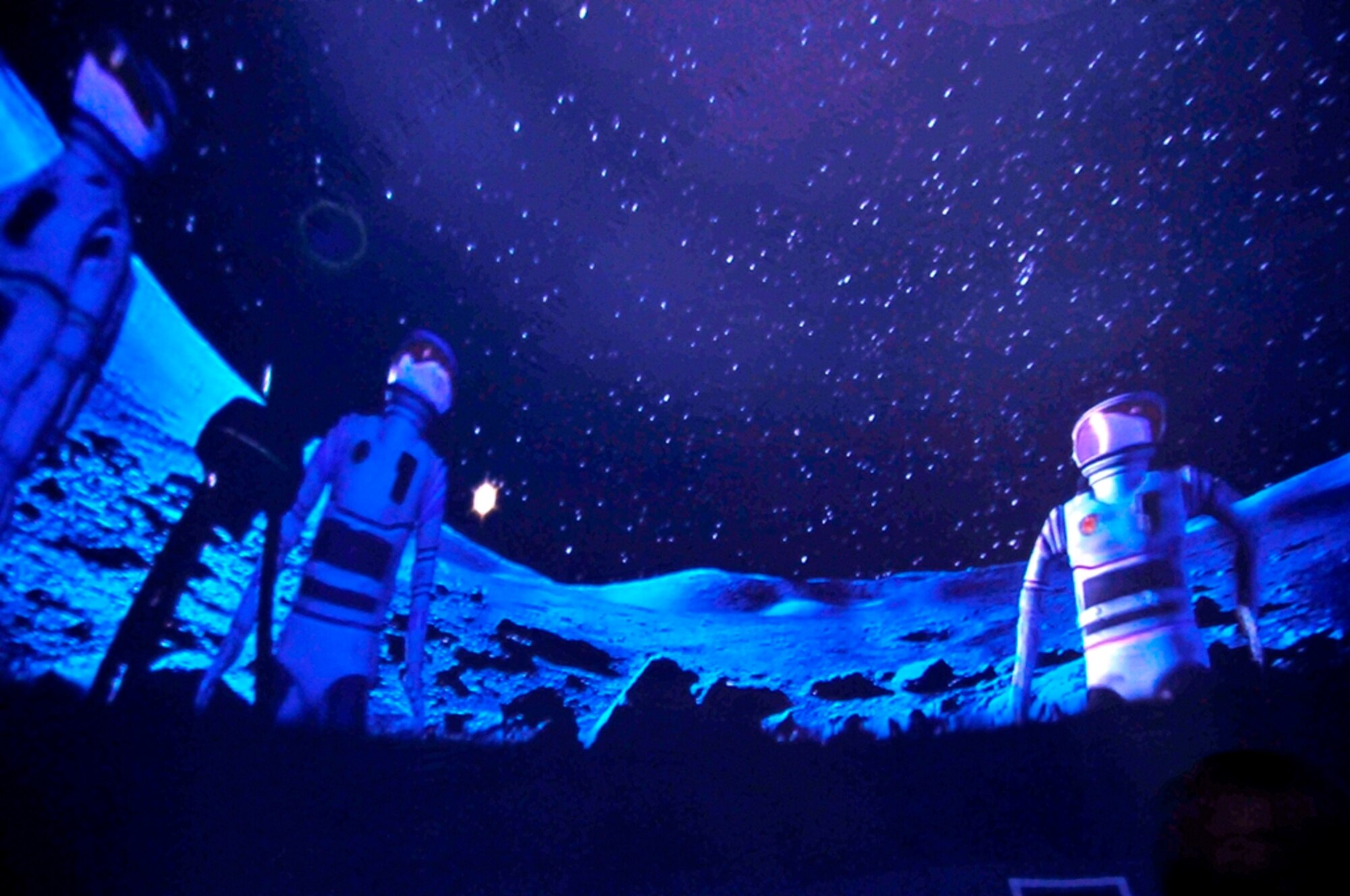 This scene of colonists on the surface of the Moon is part of a multi-media presentation that can be generated on the parabolic screen inside an inflatable planetarium in a recent STEM presentation held at AEDC’s lobby in the A&E Building. It is one of several teaching aids taken to events hosted by Jere Matty, AEDC’s STEM education outreach specialist, and AEDC’s engineers to encourage young people to pursue science, technology, engineering and mathematics educations and careers. (Photo by Jacqueline Cowan)