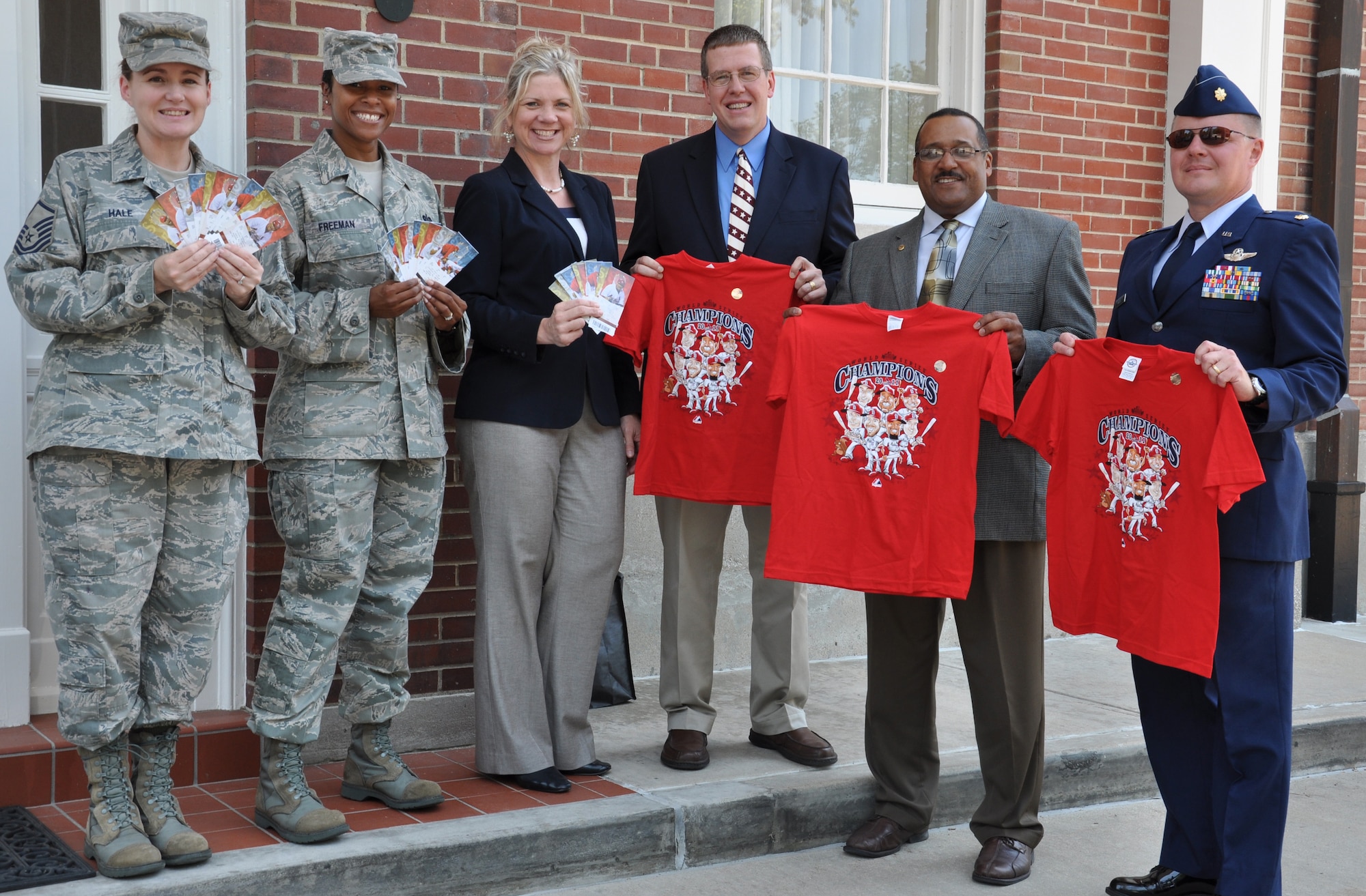 Members of Four Digit Chord donated tickets for the St. Louis Cardinals Fourth of July game to Scott’s Hearts Apart Program. They also performed the national anthem during that game, and also perform at retirement, promotion and award ceremonies at Scott and select community events. (U.S. Air Force photo/Airman 1st Class Josh Eikren)