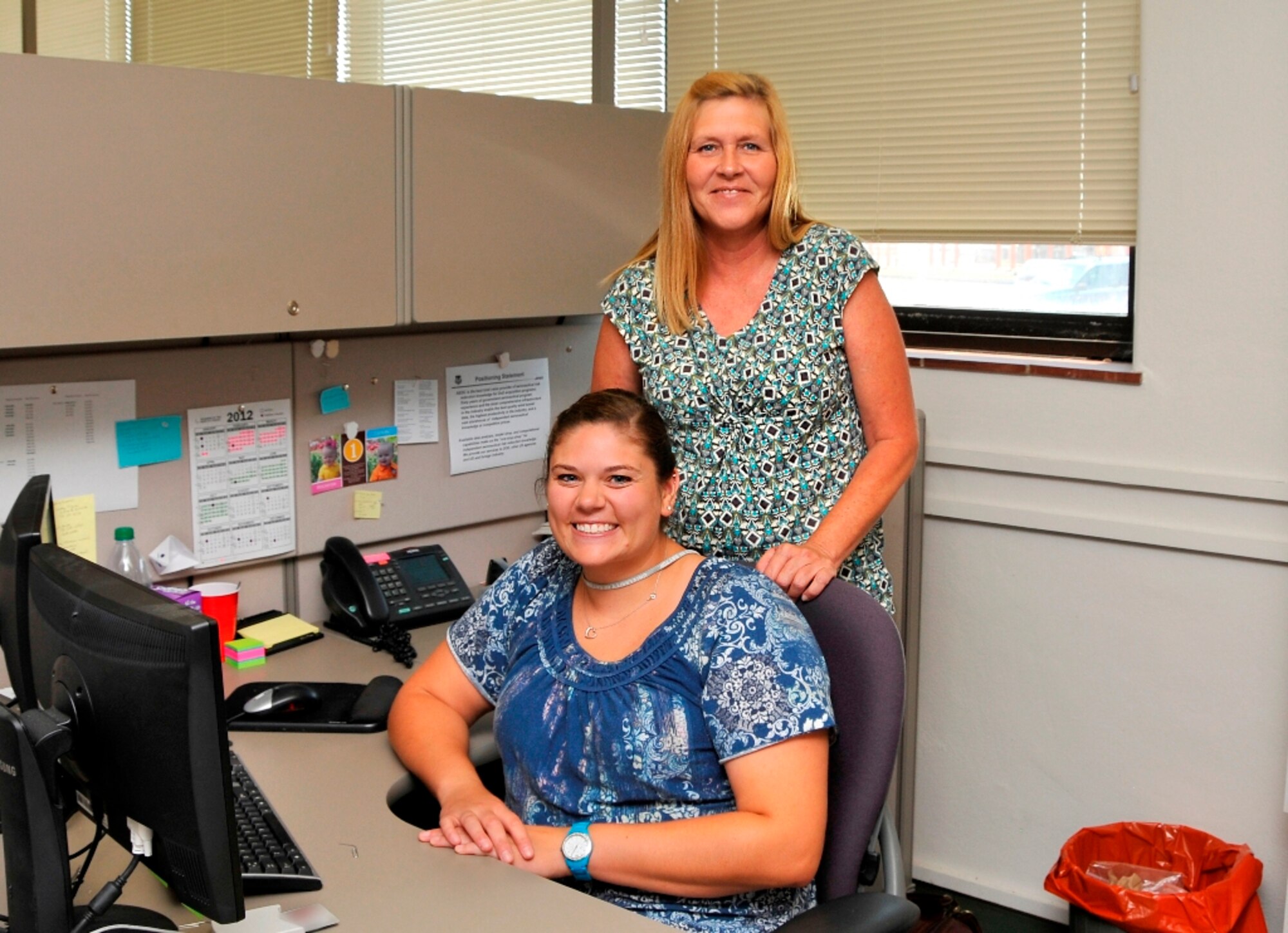 Allie Falk, seated, and Lynn Armer have taken over as AEDC’s victim advocates for the Sexual Assault Prevention and Response program. As victim advocates, they will provide support to victims as well as provide training and education for AEDC’s military and civilian population. (Photo by Jacqueline Cowan)