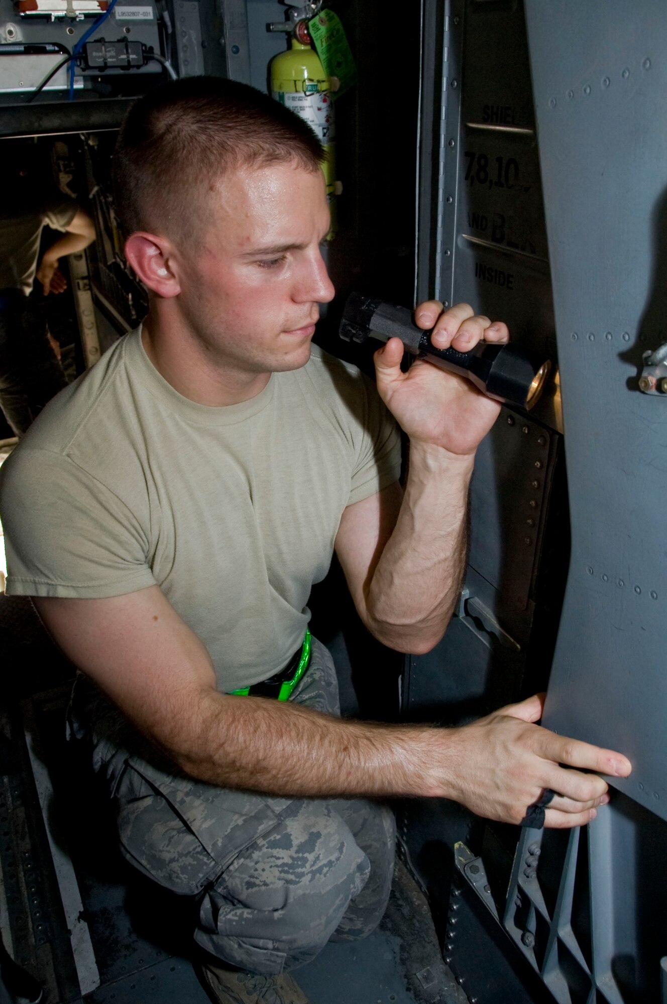 Senior Airman Brandon Craddock, 379th Expeditionary Maintenance Squadron aircrew egress systems journeyman, conducts a routine inspection on the egress system of a B-1 Lancer while deployed to Southwest Asia July 11, 2012. The egress crew must inspect the ejection systems thoroughly to make sure they are within limits, check for any leaking oil and verify the explosive lines aren’t bent or broken and in working order. (U.S. Air Force photo/Senior Airman Bryan Swink)