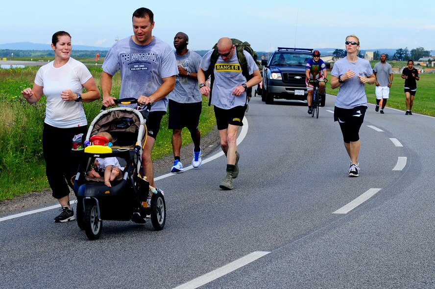 Members of Team Ramstein participate in the Stand Against Sarcoma 10K on Ramstein Air Base, Germany, July 7, 2012. The honored Tech. Sgt. Robert Murphy, 86th Communications Squadron, diagnosed with Sarcoma earlier this year. (U.S. Air Force photo/Airman 1st Class Holly Cook)