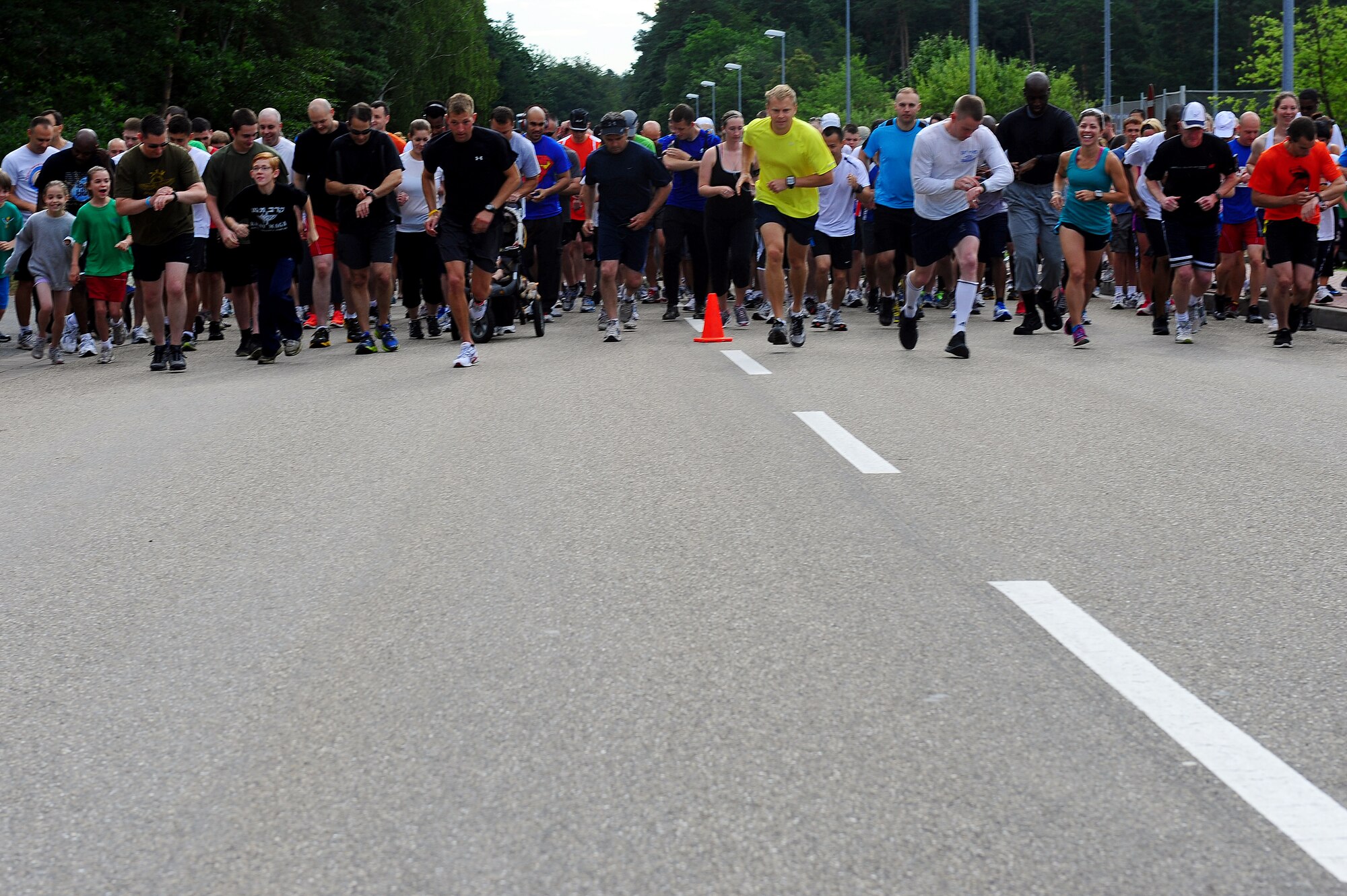 Members of Team Ramstein participate in the Stand Against Sarcoma 10K on Ramstein Air Base, Germany, July 7, 2012. The honored Tech. Sgt. Robert Murphy, 86th Communications Squadron, diagnosed with Sarcoma earlier this year. (U.S. Air Force photo/Airman 1st Class Holly Cook)