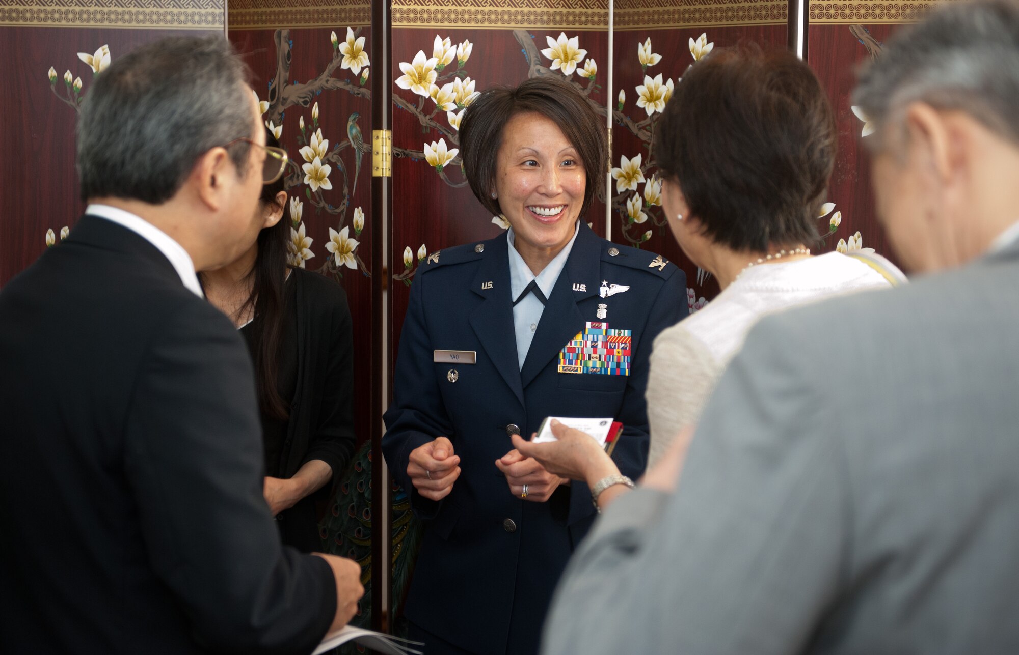 YOKOTA AIR BASE, Japan -- Col. Eveline Yao, the new 374th Medical Group commander, meets with local Japanese dignitaries after a change of command ceremony at Yokota Air Base, Japan, July 9, 2012. (U.S. Air Force photo by Airman 1st Class John D. Partlow)