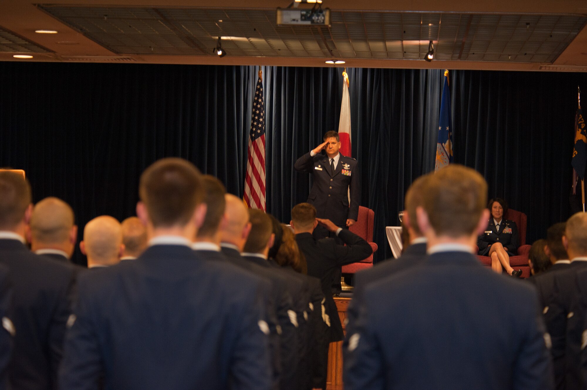 YOKOTA AIR BASE, Japan -- Col. Lee Harvis, 374th Medical Group outgoing commander, renders his final salute to his unit during a change of command ceremony at Yokota Air Base, Japan, July 9, 2012. The tradition of the military salute can be traced back to medieval knights raising their visors when passing their superiors. This age-old gesture is a universal symbol of mutual respect. (U.S. Air Force photo by Airman 1st Class John D. Partlow)