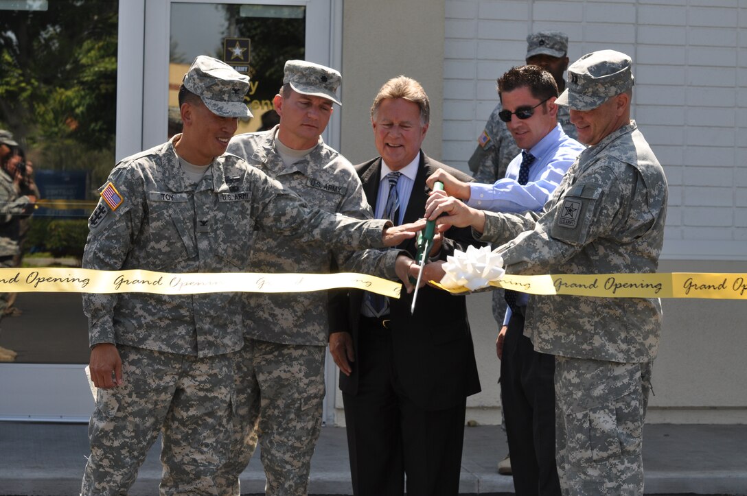 Col. Mark Toy, Los Angeles District commander, Lt. Col Robert Blankenship, L.A. Recruiting Battalion commander, Bob Huber, City of Simi Valley mayor, J.D. Kennedy, office of Rep. Buck McKeon, and Capt. Jeffrey Warstler, company commander, cut the ribbon ceremonially opening the Los Angeles Recruiting Battalion's newest station in Simi Valley, Calif., June 20.  The Los Angeles District manages more than 250 recruiting station leases throughout Southern California, Arizona and Nevada, as part of the Department of Defense Recruiting Facilities Program.