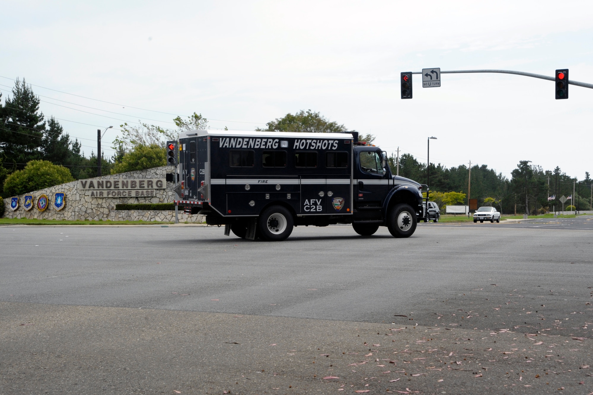 VANDENBERG AIR FORCE BASE, Calif. -- Ten Vandenberg Hot Shots crew members return home in their crew vehicle here, Thursday, July 12, 2012. The Hot Shots were fighting wildfires in Colorado and Wyoming, which burned 29,168 acres total and destroyed nearly 350 houses in Colorado. (U.S. Air Force photo/Jerry E. Clemens Jr.) 