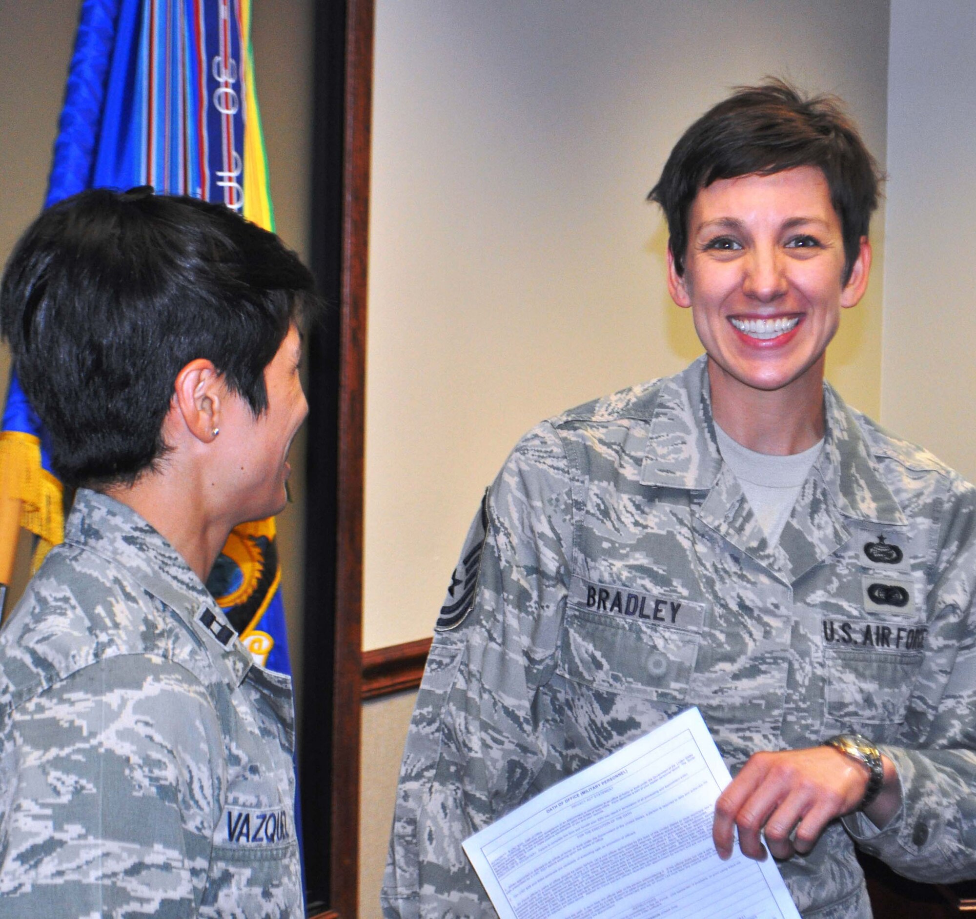 TRAVIS AIR FORCE BASE, Calif. -- Master Sgt. Heather Bradley, right, has left the 349th Equal Opportunity office. But is now 2nd Lt. Heather Bradley, Medical Services officer, assigned to the 349th Aeromedical Staging Squadron. (U.S. Air Force photo/Senior Master Sgt. Ellen Hatfield)