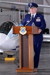 Col. Joseph Rizzuto speaks at the change of command ceremony  where he replaced Col. Christopher Plamp as commander of the 306th Flying Training Group. Rizzuto comes to the Academy from Maxwell Air Force Base, Ala. (U.S. Air Force Photo/Mike Kaplan)