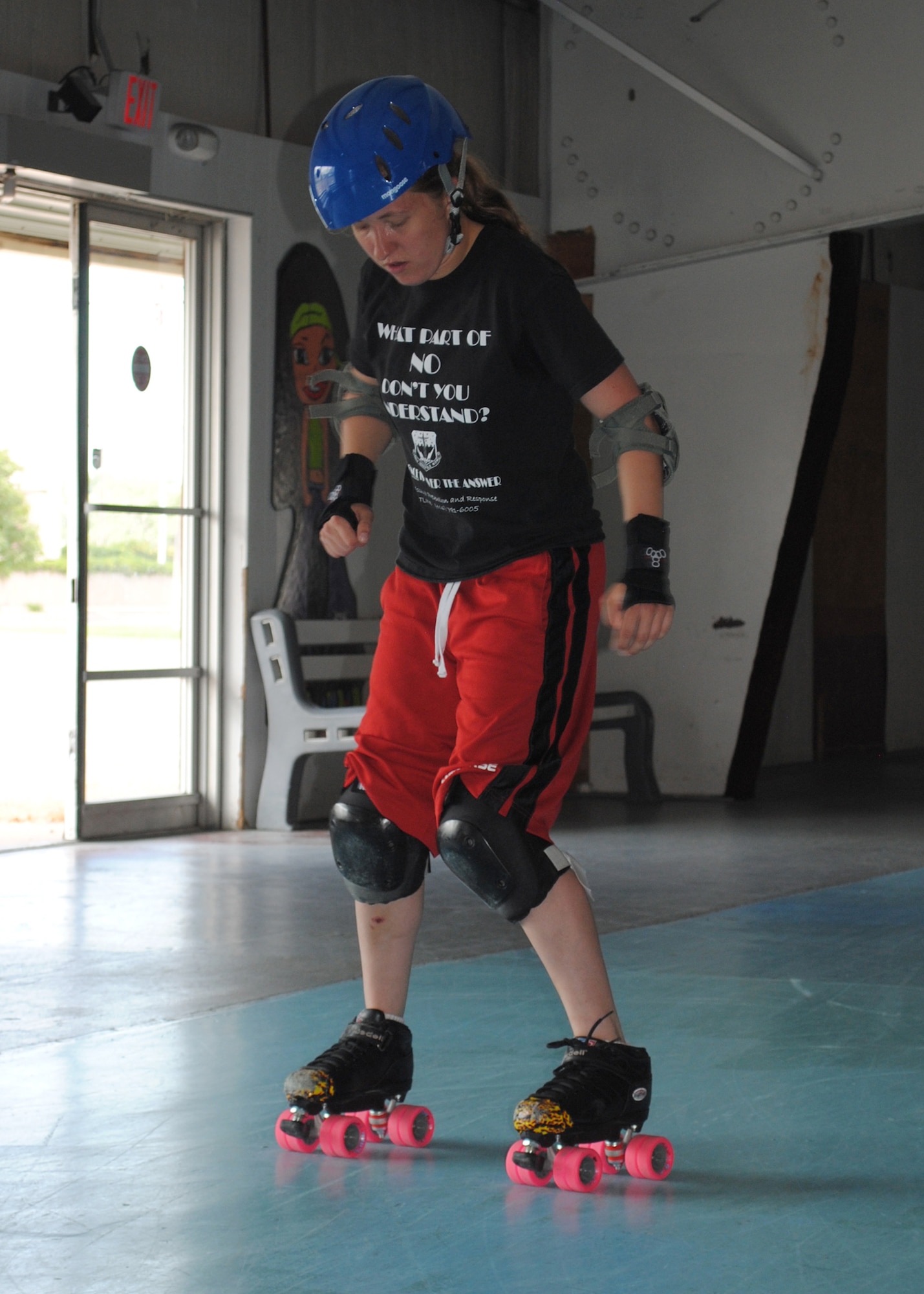 Airman 1st Class Sarah Watling, 341st Security Forces Group tactical response force member, practices roller skating backwards. Watling has been training with the Electric City Roller GrrrlZ for more than two months and is still considered “fresh meat.” Watling will be assessed on her progression before she can be a competing member of the team. (U.S. Air Force photo/Airman 1st Class Katrina Heikkinen)
