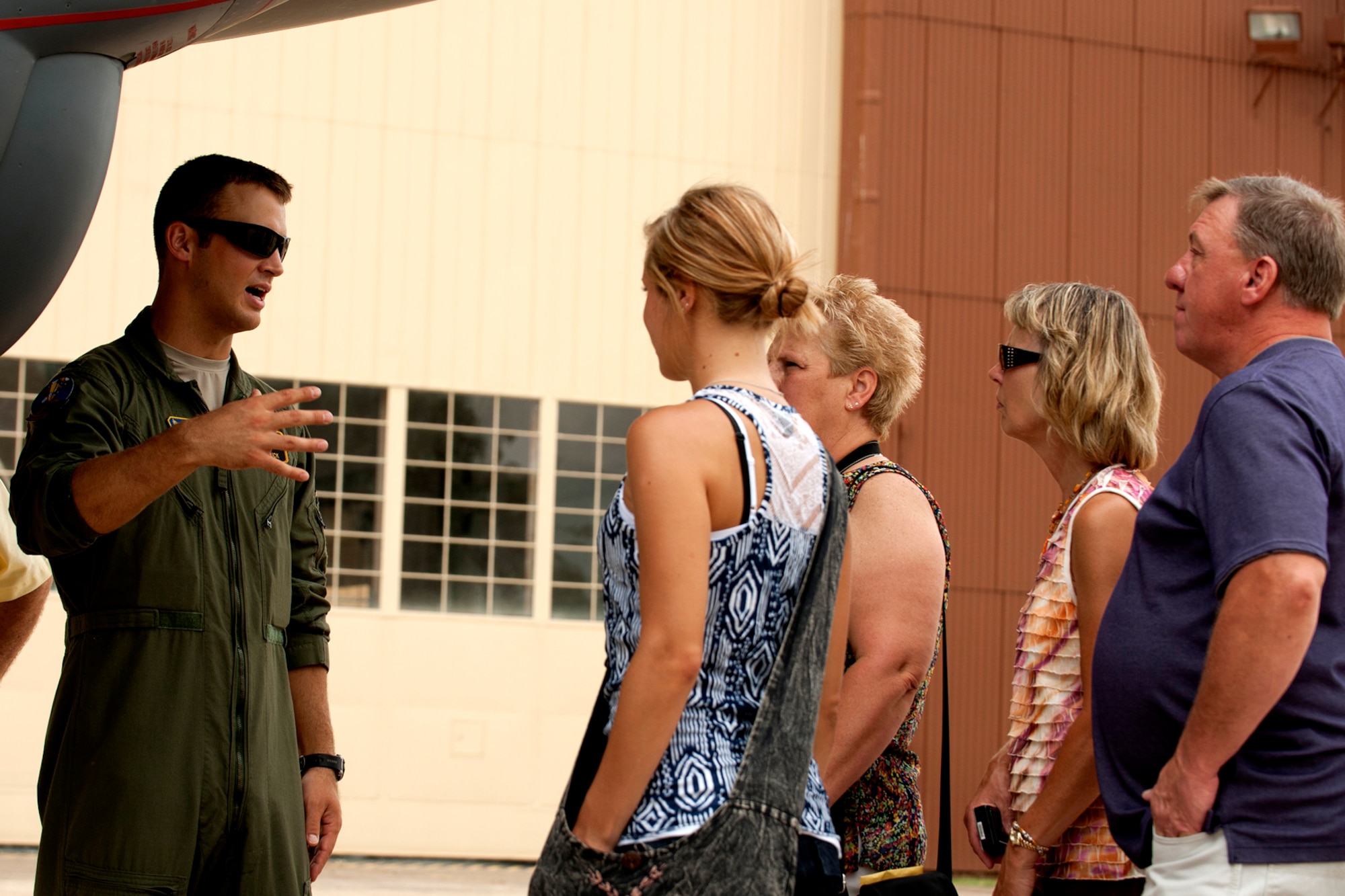 U.S. Air Force 1st Lt. Rylan Kabanuck talks to friends and family about the capabilities of the B-52H Stratofortress following a graduation ceremony on Barksdale Air Force Base, La., July 10, 2012. Kabanuck is a graduate of the Formal Training Unit Class 12-01 where he spent 9 months learning to fly the B-52. (U.S. Air Force photo by Master Sgt. Greg Steele/Released)