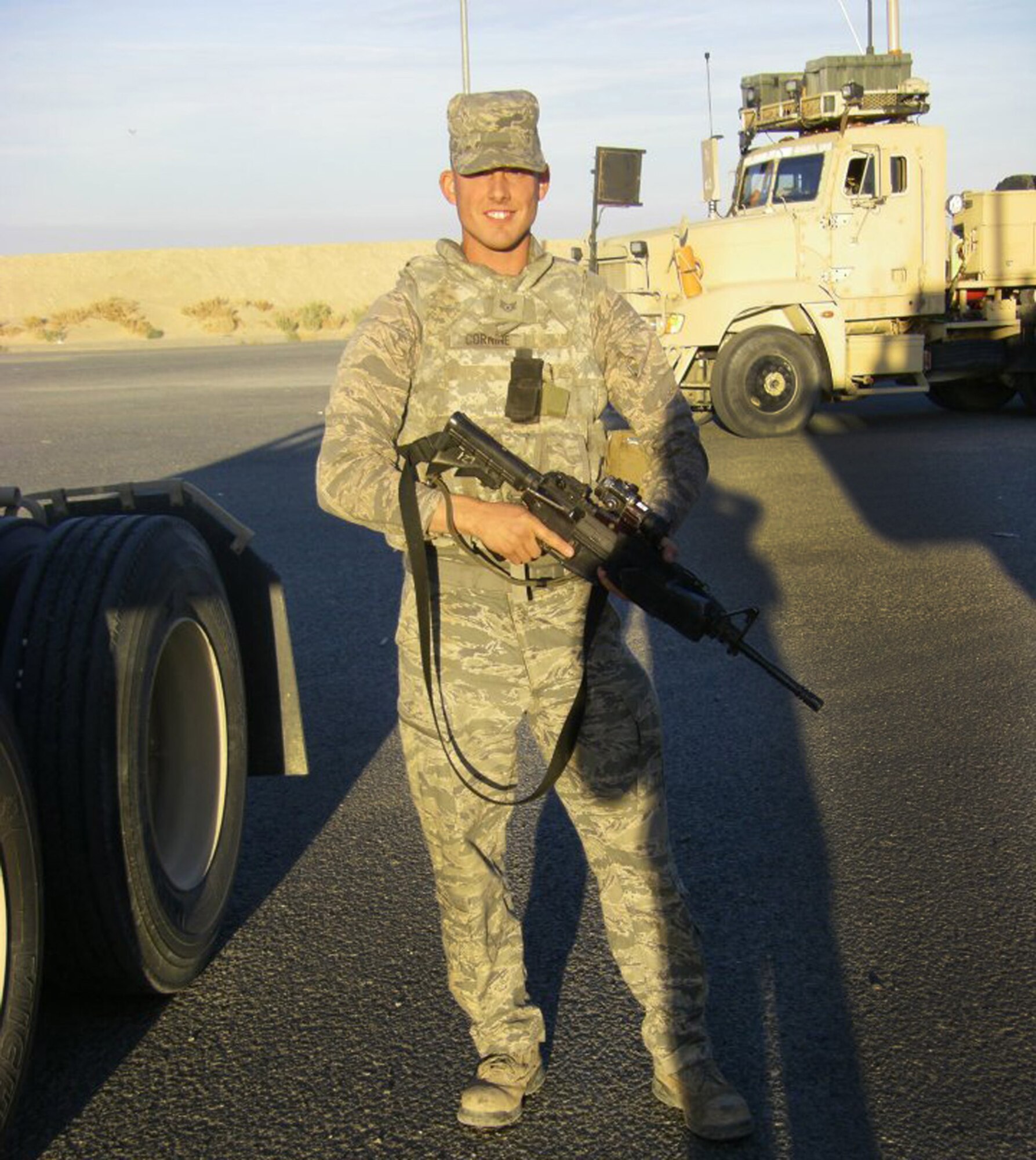 CAMP ARIFJAN, Kuwait  -- Staff Sgt. Nathan Cornine, 509th Logistics Readiness Squadron vehicle operator and dispatcher, returned from his fourth deployment to Camp Arifjan, Kuwait Jan. 21, 2012. During his six months in Southwest Asia, Cornine performed many responsibilities to include line haul convoy duty and being a radio technician operator.  (Courtesy photo)