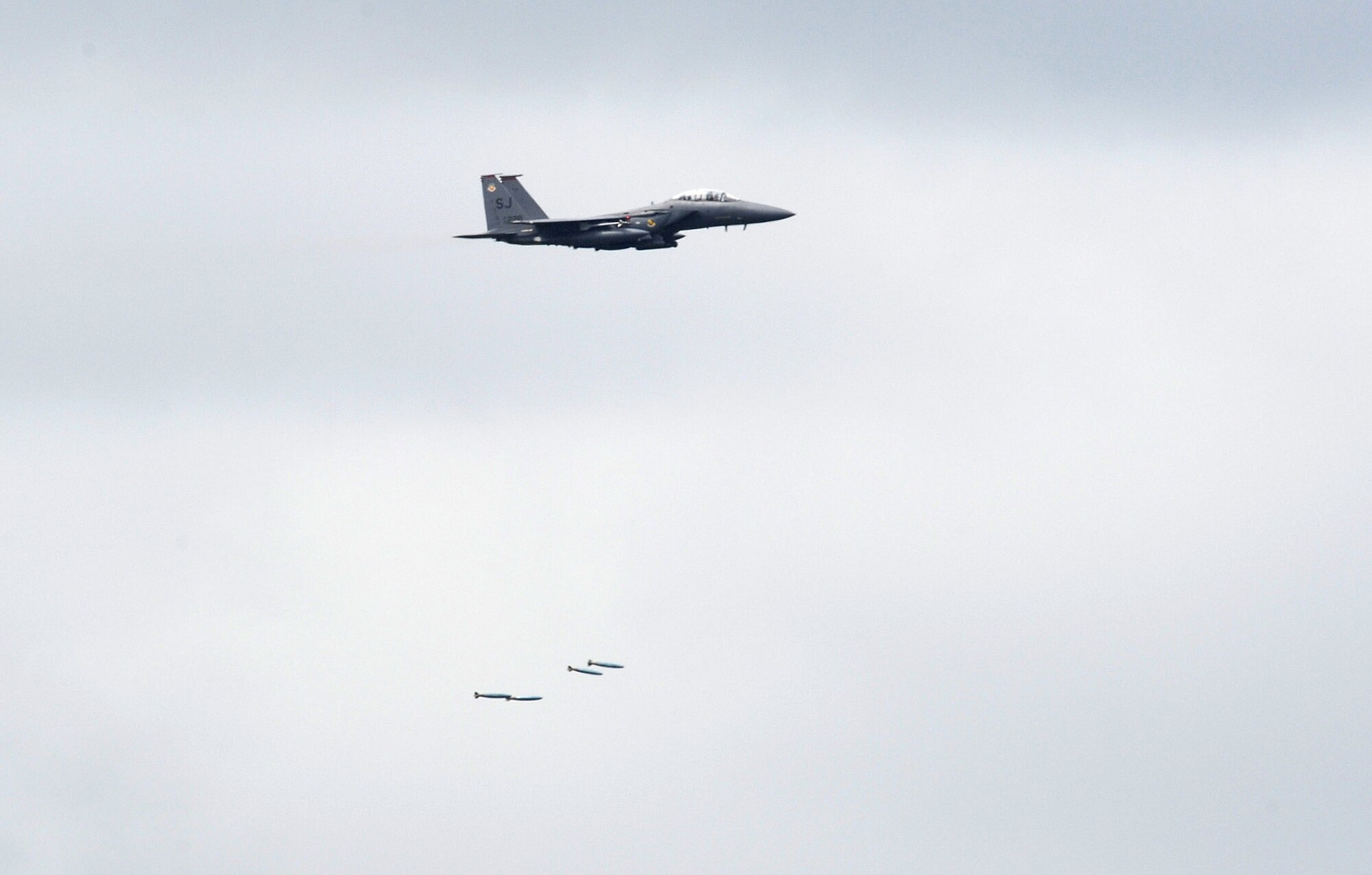 An F-15E Strike Eagle from the 333rd Fighter Squadron drops ordnance during a training mission at the Dare County Bomb Range, N.C., July 11, 2012. The range allows F-15E aircrew the ability to hone their target-engaging skills. (U.S. Air Force photo/Senior Airman Gino Reyes/Released) 