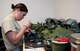 Airman 1st Class Lindsy Hall, 6th Air Refueling Squadron aircrew flight equipment journeyman, puts together a mask for a C-17 Globemaster III pilot Tuesday. AFE personnel are in charge of ensuring all flight equipment is in perfect working order, from flight helmets to oxygen masks. (U.S. Air Force photo/Airman 1st Class Nicole Leidholm)
