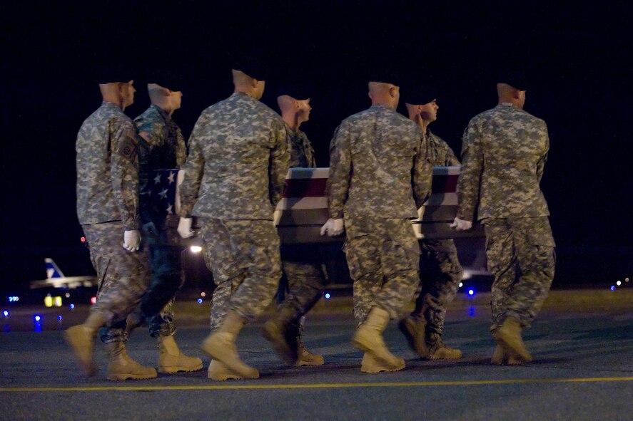 A U.S. Army carry team transfers the remains of Army Spc. Cameron J. Stambaugh of Spring Grove, Pa., at Dover Air Force Base, Del., July 12, 2012. Stambaugh was assigned to the 978th Military Police Company, 93rd Police Battalion, Fort Bliss, Texas. (U.S. Air Force photo/Adrian R. Rowan)