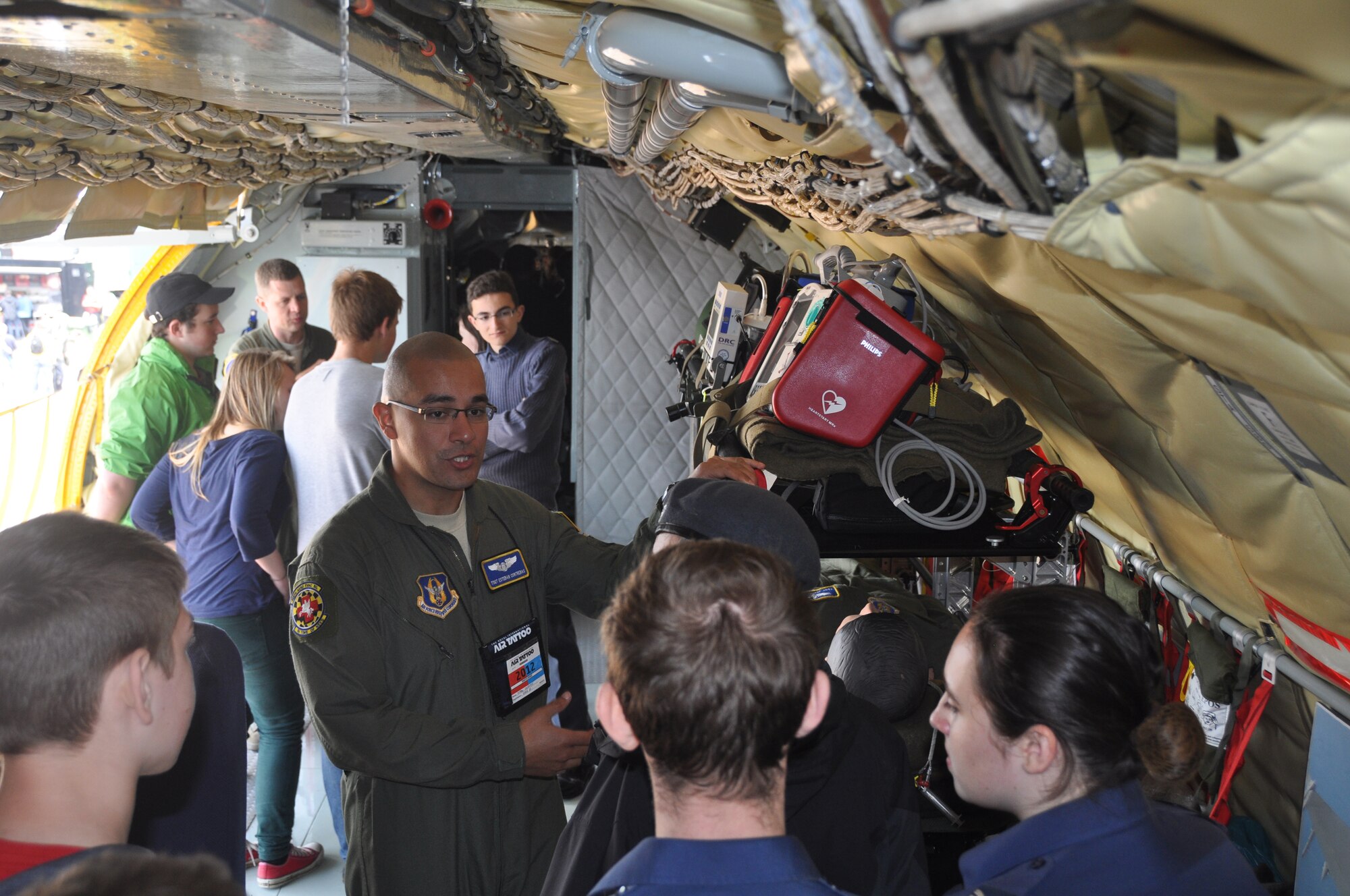 Tech Sgt. Esteban Contreras, an aeromedical medical technician from Joint Base Andrews, Md., shares his military experience with Royal Air Force cadets at the annual international air show held July 7-8 at RAF Fairford in the United Kingdom. (U.S. Air Force photo/Master Sgt. Donna T. Jeffries)
