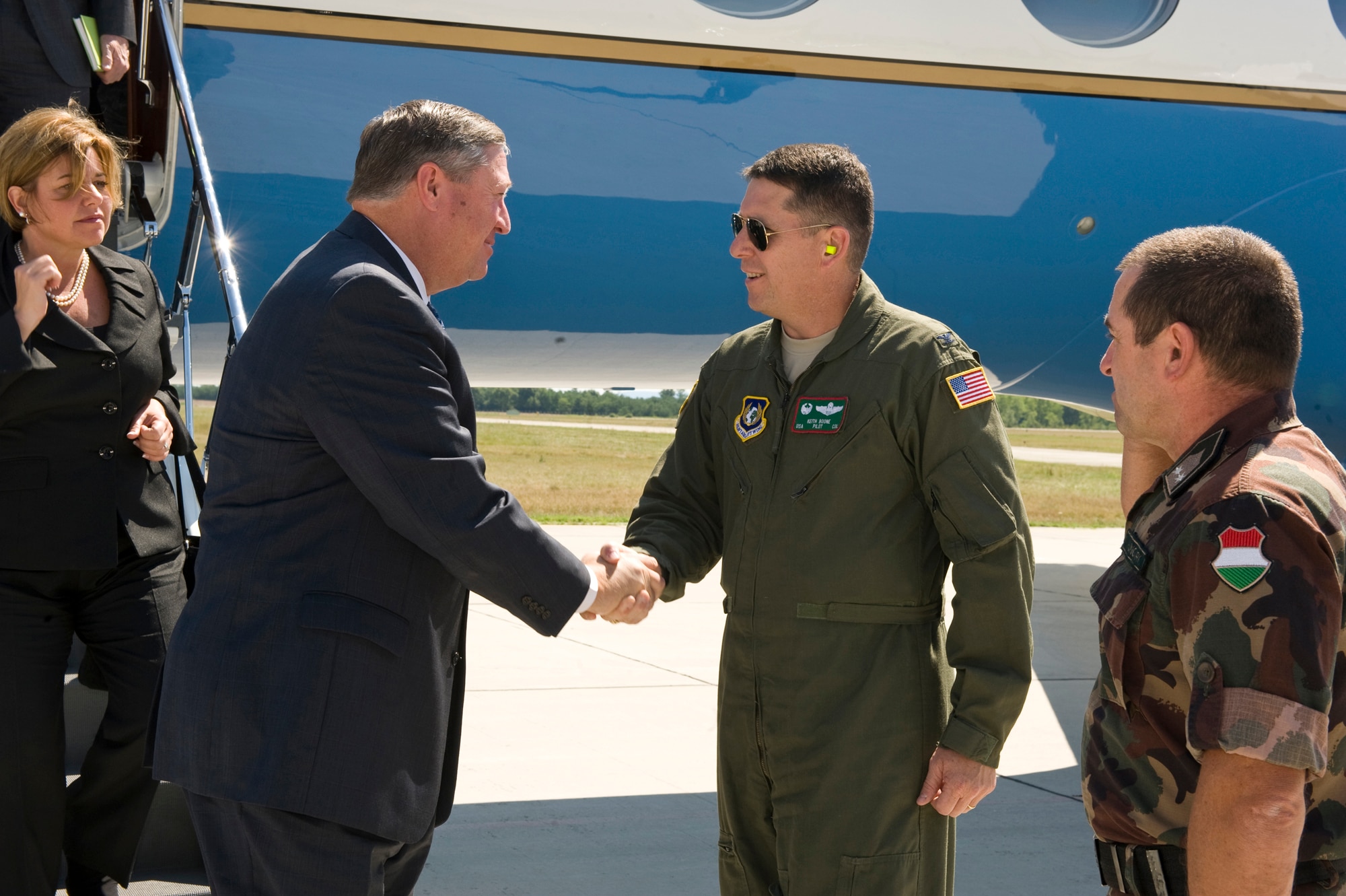 Col. Keith Boone, commander of the Heavy Airlift Wing greets Secretary of the Air Force Michael Donley after his arrival at Pápa Air Base, Hungary, July 11, 2012. The secretary visited the HAW to speak with Airmen about the direction of the Air Force, meet with them on the job. (U.S. Air Force photo/Master Sgt. Wayne Clark)