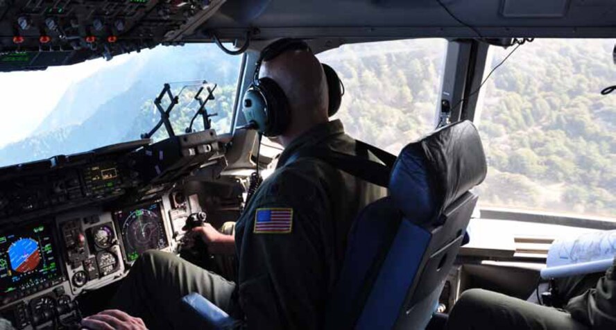 Lt. Col. Tim Harris conducts a series of flyovers around Southern Calif., during 4th
of July celebrations. The mission had to be flown with exact timing and precision
because several flyover point were skillfully coordinated to have the aircraft pass
over just as the National Anthem ended. (U.S. Air Force photo by Staff Sgt. Megan Crusher)