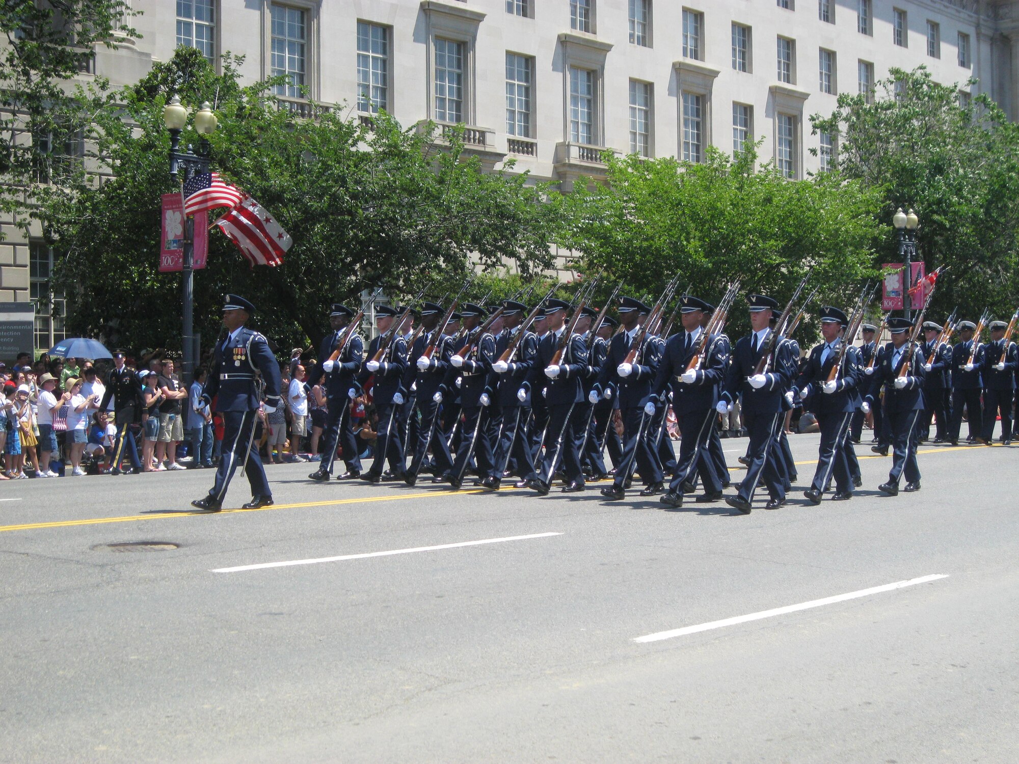 The U.S. Air Force Honor Guard marches in formation during the Independence Day Parade in Washington, D.C., July 4, 2012. More than 20 members of Team Seymour were selected to attend the parade and a dinner at the the White House to celebrate the holiday. (U.S. Air Force photo/Staff Sgt. Aimee Inman/Released)
