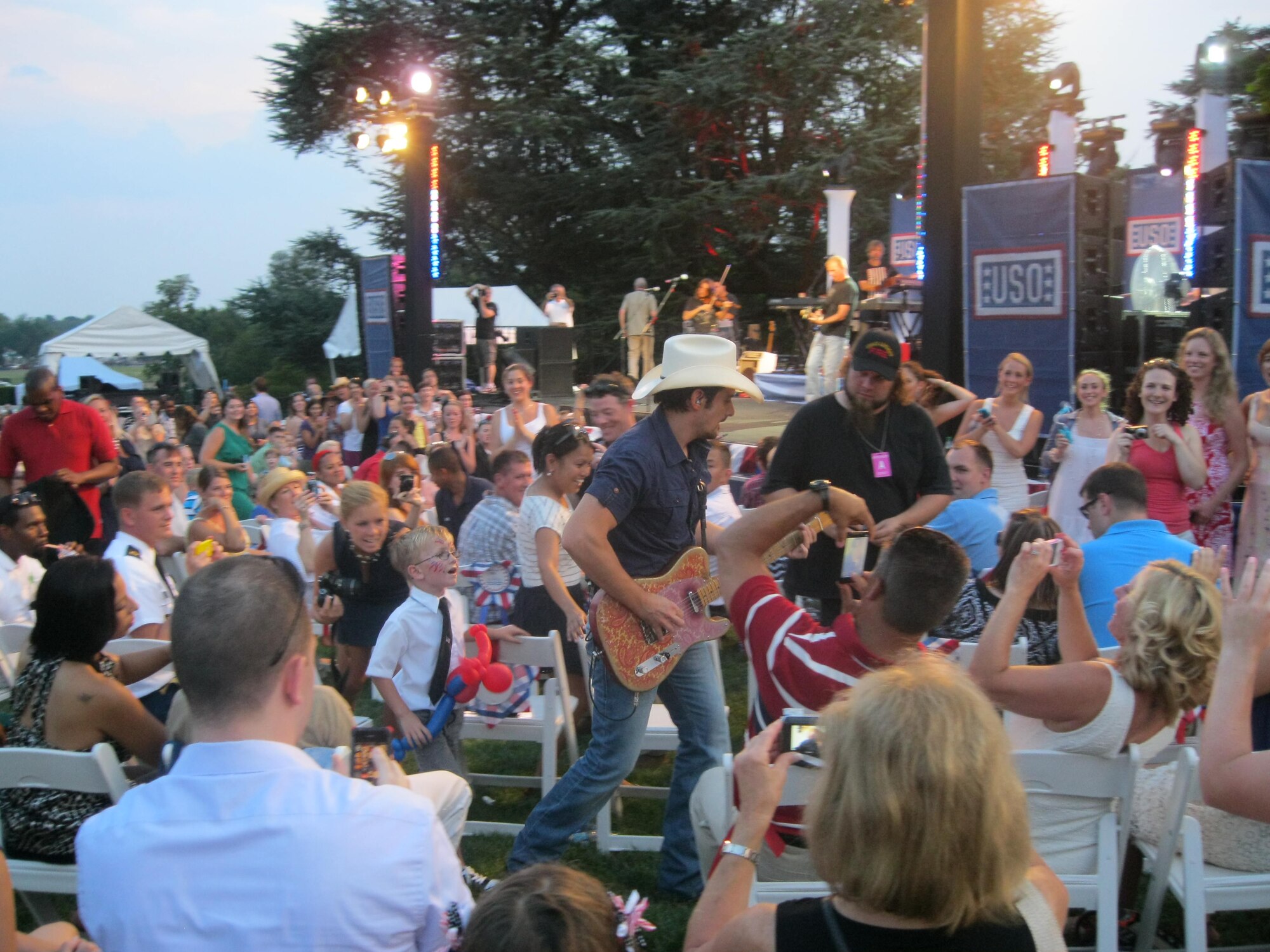 Country music singer Brad Paisley performs for service members and their families during an Independence Day celebration at the White House in Washington, D.C., July 4, 2012. More than 1,200 military members and their families attended the event, which included fireworks, dinner and performances by the Marine Corps Band. (U.S. Air Force photo/Staff Sgt. Aimee Inman/ Released)