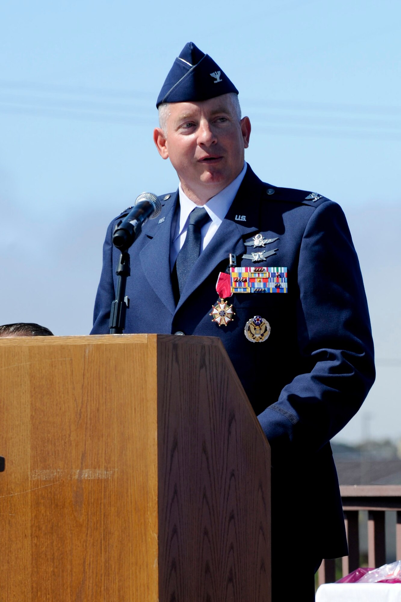 VANDENBERG AIR FORCE BASE, Calif. -- Col. Kelly Kirts, the departing 30th Mission Support Group commander, addresses the crowd during a change of command at the parade grounds here Tuesday, July 10, 2012. The 30th MSG provides security, law enforcement, disaster response, civil engineer, base services, mission support, morale services, contracting, and logistical support for Vandenberg AFB. (U.S. Air Force photo/Staff Sgt. Levi Riendeau)