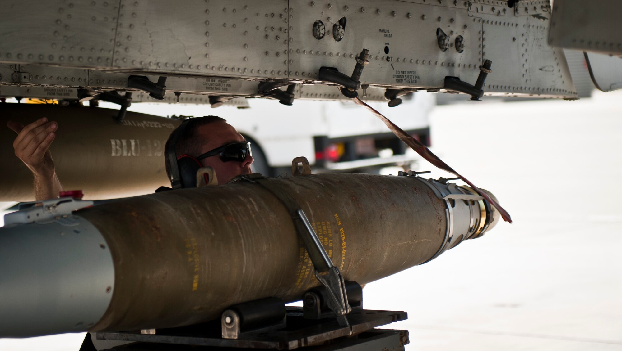 Airmen from the 455th Aircraft Maintenance Squadron, load a GBU-38 smart bomb on to a U.S. Air Force A-10 Thunderbolt II at Bagram Airfield, Afghanistan, June 30, 2012. The bombs were assembled and tested by munitions Airmen with the 455th Maintenance Squadron. (U.S. Air Force photo/Capt. Raymond Geoffroy)