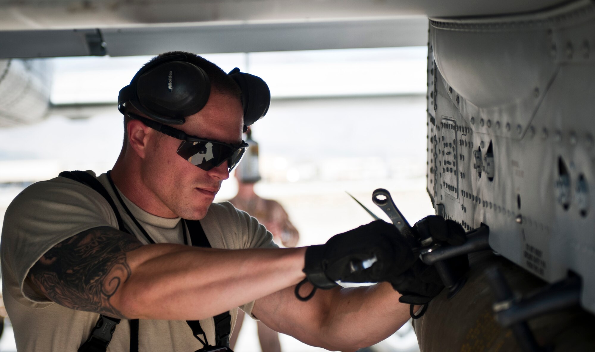 Airmen from the 455th Aircraft Maintenance Squadron, load a GBU-38 smart bomb on to a U.S. Air Force A-10 Thunderbolt II at Bagram Airfield, Afghanistan, June 30, 2012. The bombs were assembled and tested by munitions Airmen with the 455th Maintenance Squadron. (U.S. Air Force photo/Capt. Raymond Geoffroy)