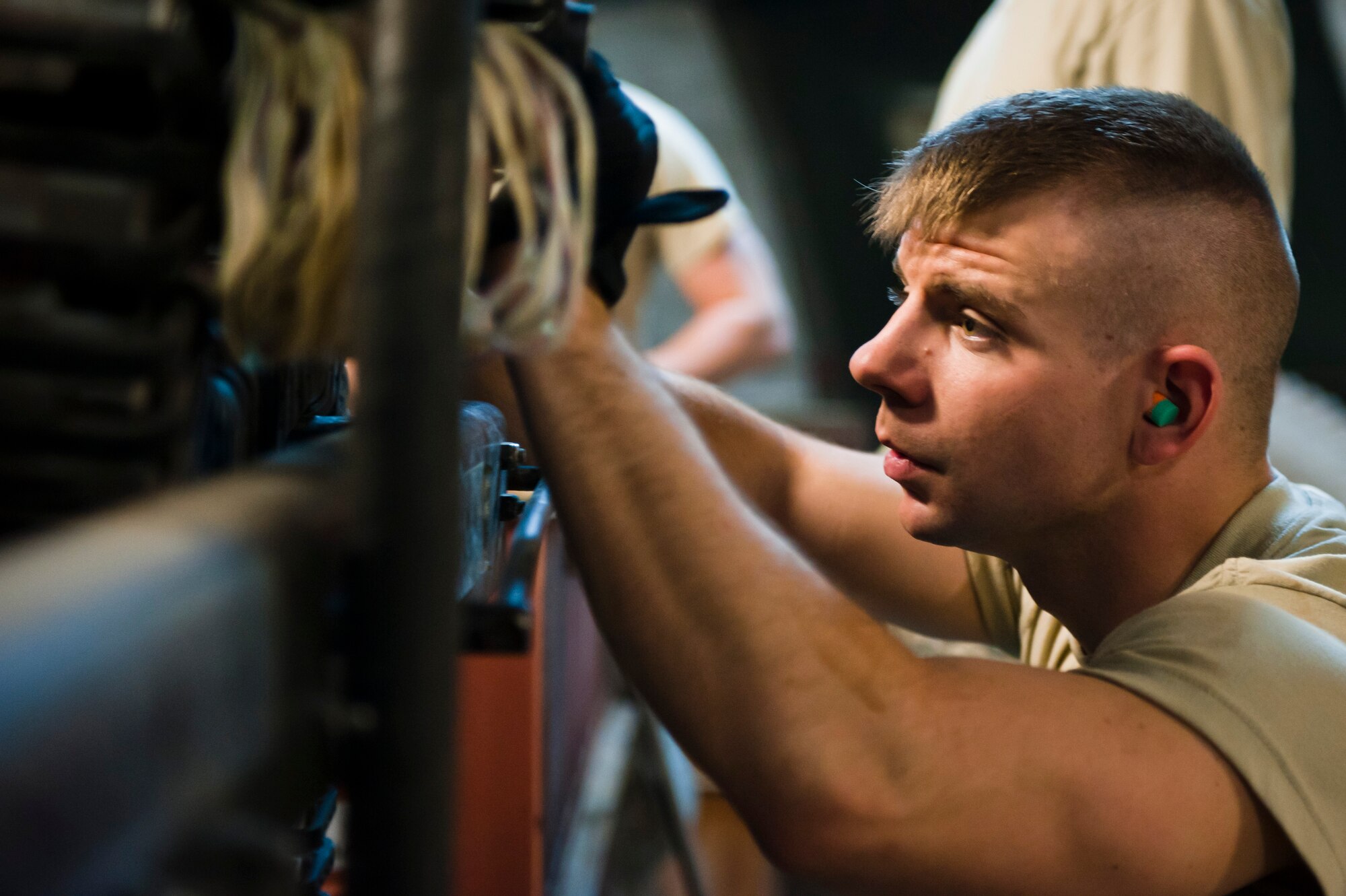 SrA Jerry Satterfield, Munitions Systems Specialist with the 455th Maintenance Squadron, loads 30mm High Explosive Incendiary rounds into containers to be loaded on U.S. Air Force A-10 Thunderbolt IIs at Bagram Airfield, Afghanistan, June 29, 2012. Satterfield and his fellow maintainers sustain the fight by providing reliable, precise firepower to BAF’s aircrews. (U.S. Air Force photo/Capt. Raymond Geoffroy)