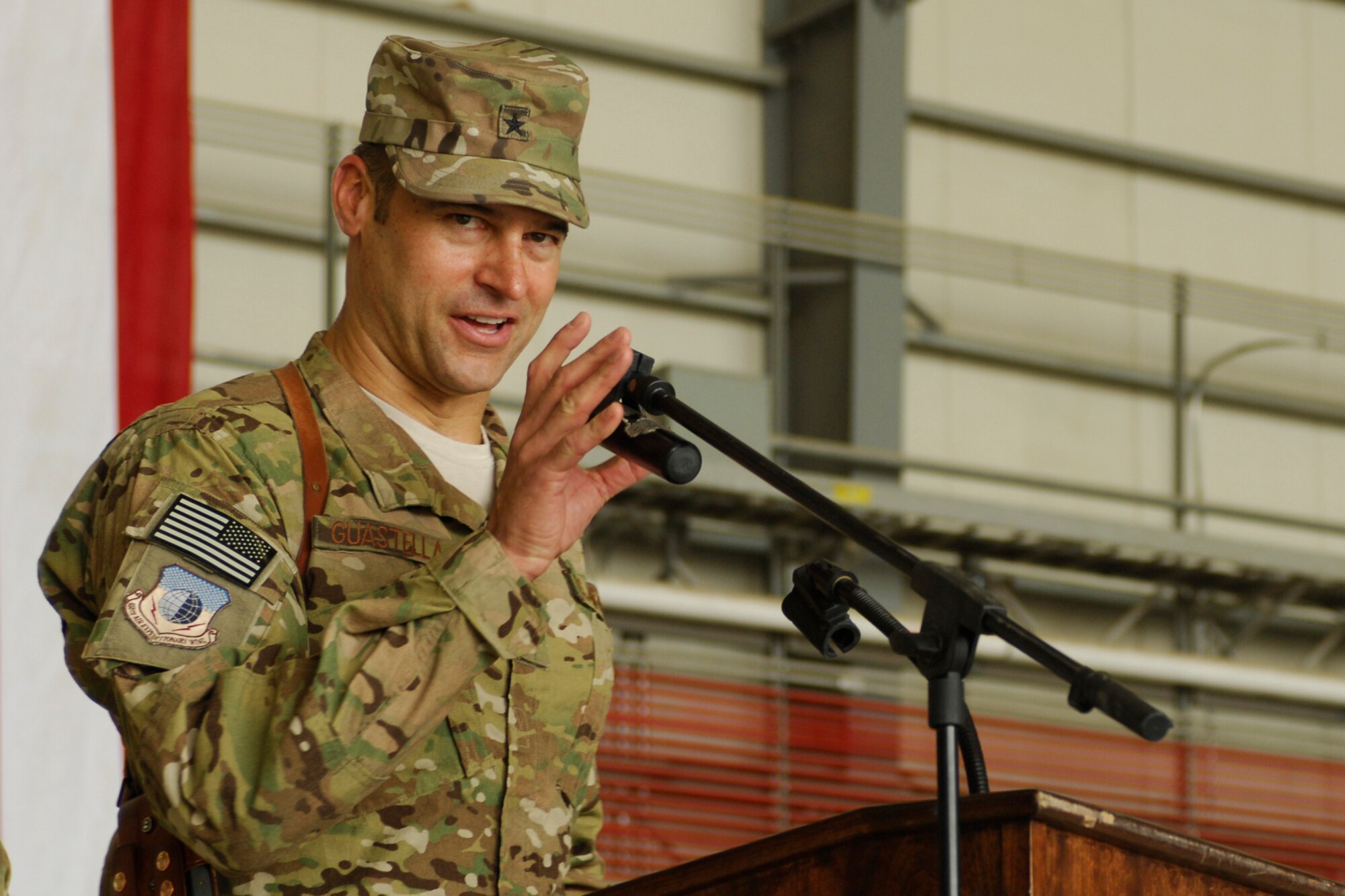 Brig. Gen. Joseph Guastella addresses the 455th Air Expeditionary Wing after assuming command of the wing at Bagram Airfield, Afghanistan, July 12, 2012. Guastella assumed command of the wing after Brig. Gen. Thomas Deale relinquished command. (U.S. Air Force photo/SSgt. Jeff Nevison)