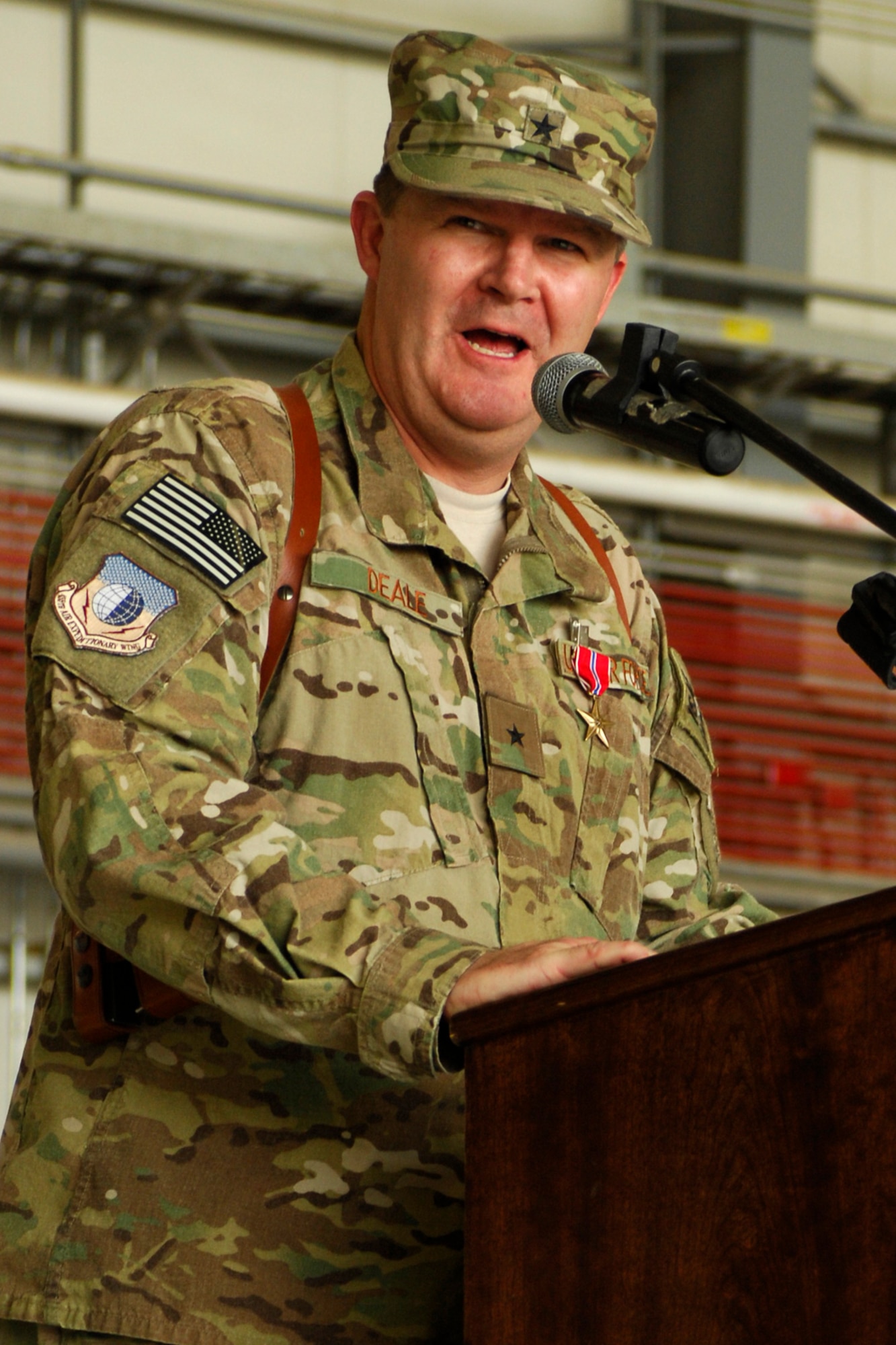 Brig. Gen. Thomas Deale addresses the 455th Air Expeditionary Wing before turning over command during the AEW Change of Command ceremony at Bagram Airfield, Afghanistan, July 12, 2012. (U.S. Air Force photo/Staff Sgt. Jeff Nevison)