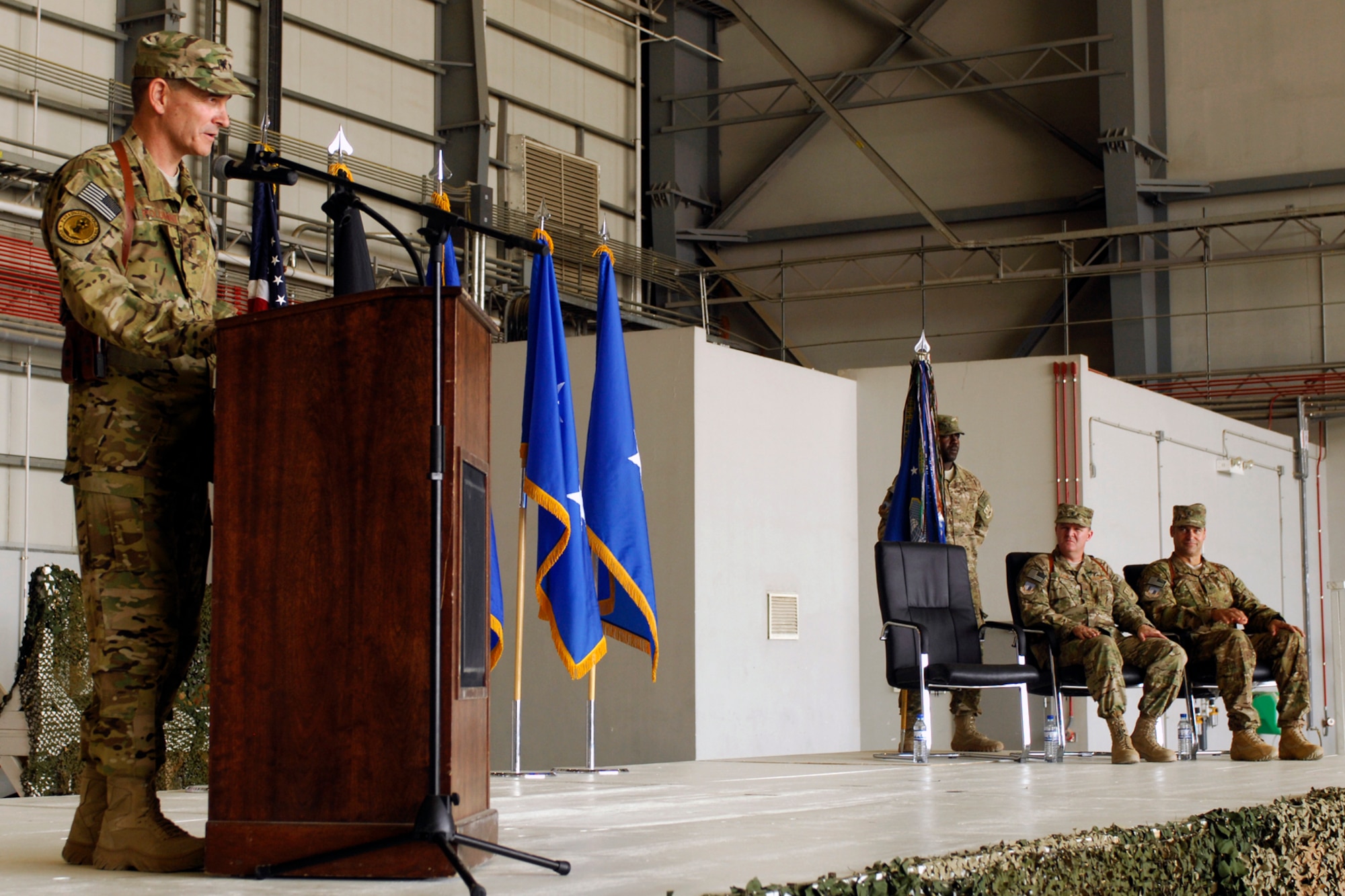 Maj. Gen. H. D. Polumbo, 9th Air and Space Expeditionary Task Force-Afghanistan commander, addresses the 455th Air Expeditionary Wing during the 455 AEW Change of Command at Bagram Airfield, Afghanistan, July 12, 2012. Brig. Gen. Thomas Deale relinquished command of the wing and Brig. Gen. Joseph Guastella assumed command. (U.S. Air Force photo/SSgt. Jeff Nevison)