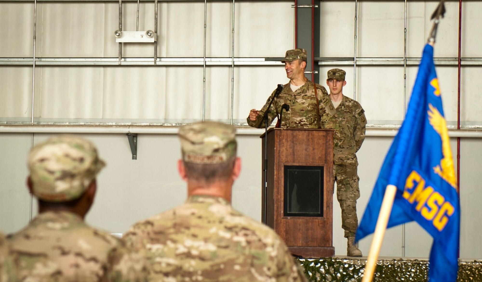 Brig. Gen. Joseph Guastella, 455th Air Expeditionary Wing commander, speaks to assembled 455 AEW Airmen and guests during the wing’s change of command ceremony at Bagram Airfield, Afghanistan, July 12, 2012. Guastella is now responsible for leading the 455 AEW in providing dedicated airpower to coalition forces in Afghanistan. (U.S. Air Force Photo/Capt. Raymond Geoffroy)